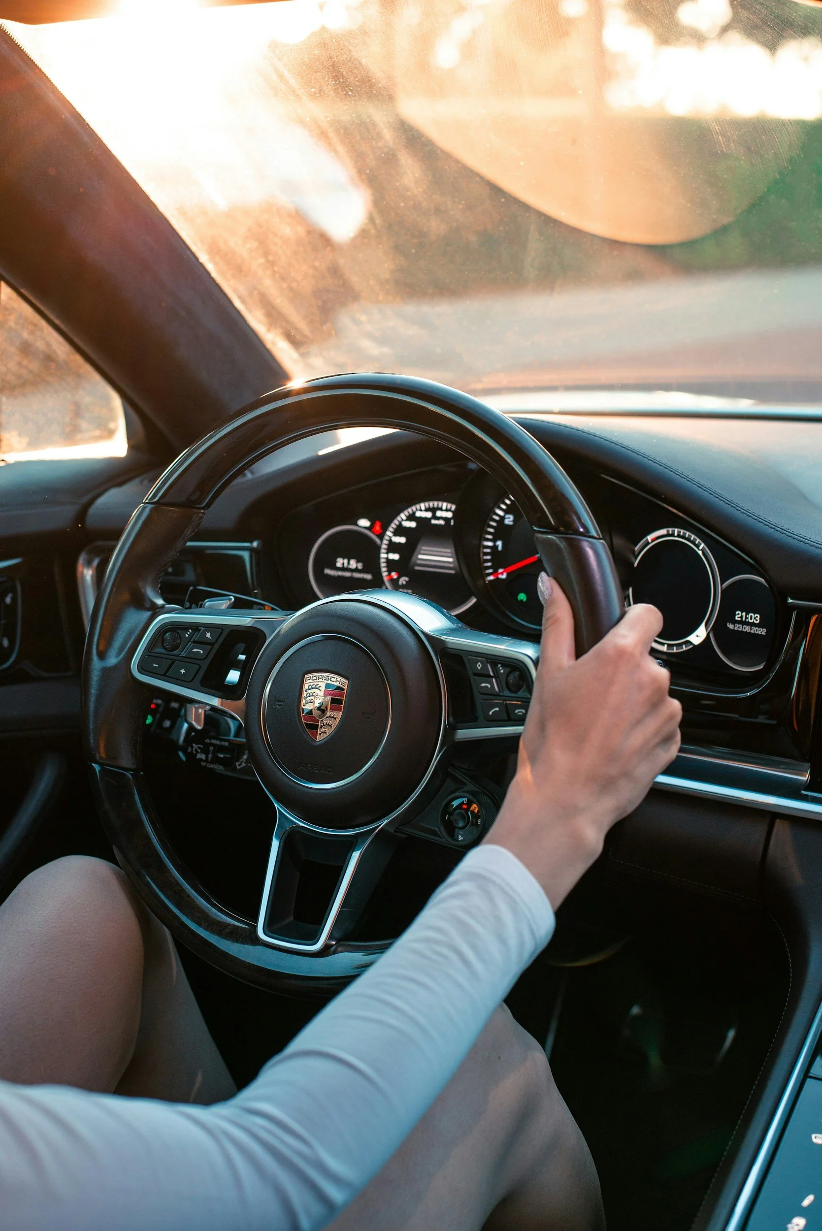 Porsche steering wheel and dash after interior car detail