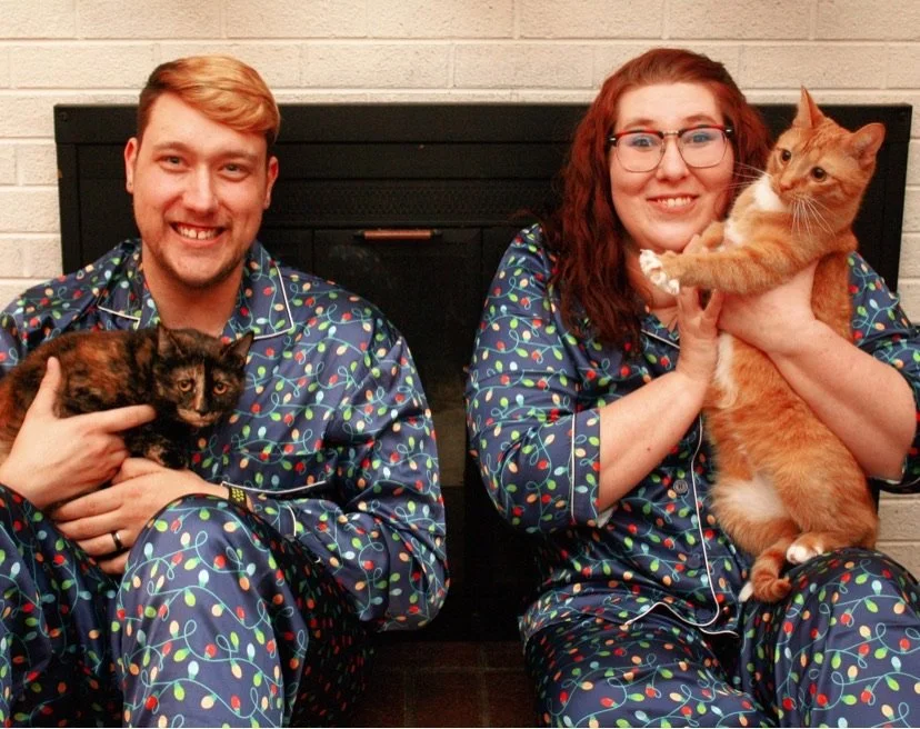 Sam and Becca with their two, very loved cats