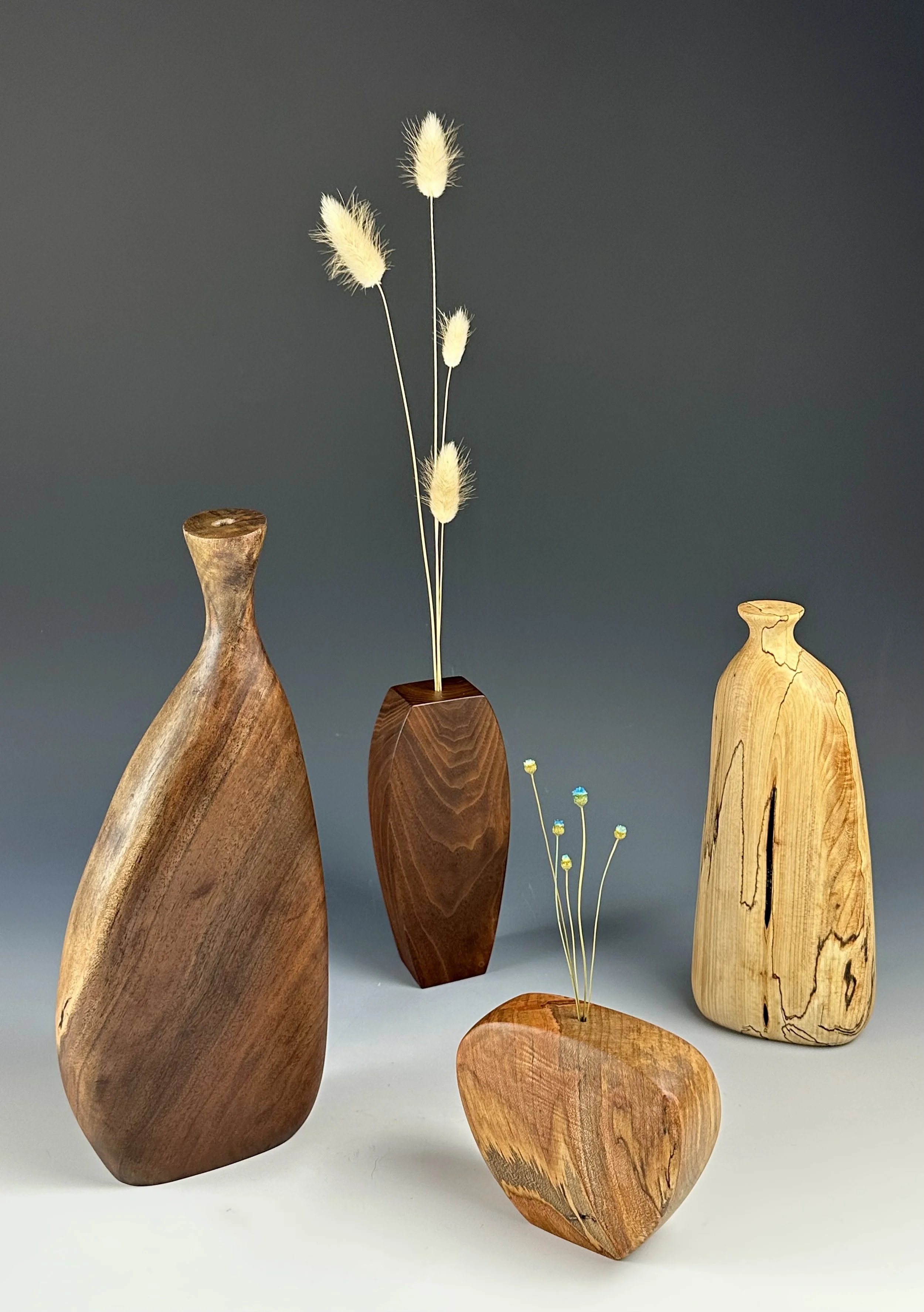 Hand carved wooden vases by Oyster Point Woodworks