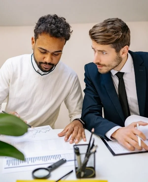 Happy professionals with documents