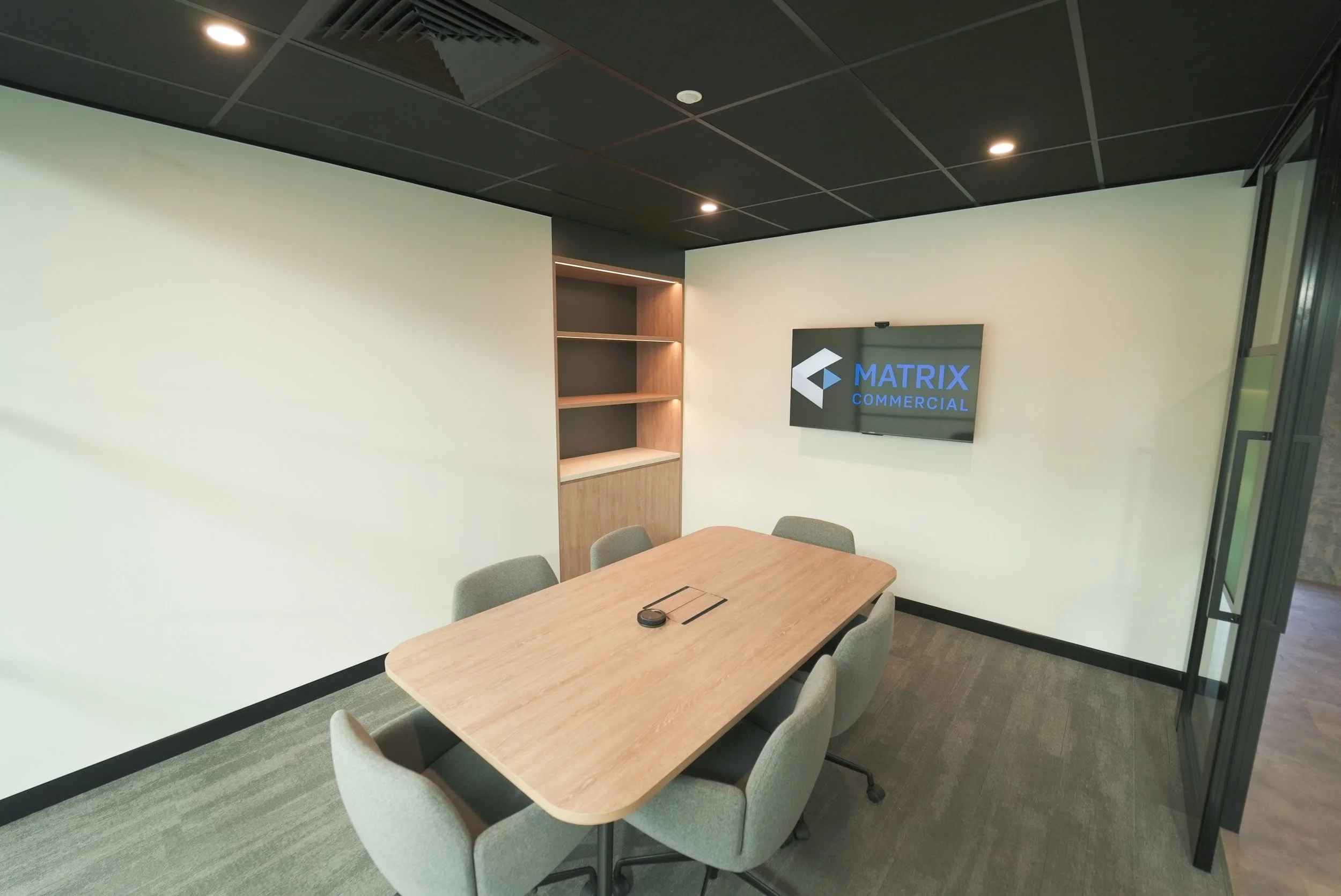 Innovync Office & Warehouse Fitout | Office Meeting Room Design Brisbane

This Innovync office and warehouse fitout features a contemporary meeting room designed to support presentations, discussions, and day-to-day workplace functionality. The space