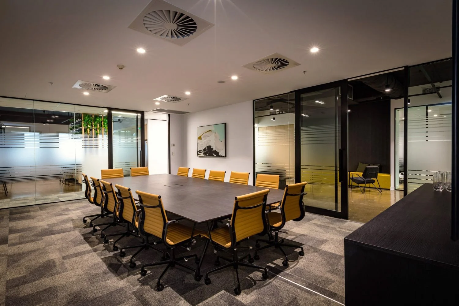 Premise Office Fitout | Executive Boardroom Design Brisbane

This Premise office fitout features a contemporary executive boardroom designed to support meetings, presentations, and workplace collaboration. The space incorporates a sleek black confere