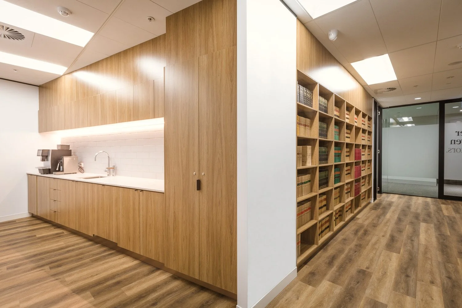 Tucker & Cowen Office Fitout | Custom Joinery & Legal Office Design Brisbane

This Tucker & Cowen office fitout showcases custom joinery designed to integrate a workplace kitchenette, legal library, and functional storage within a contemporary office