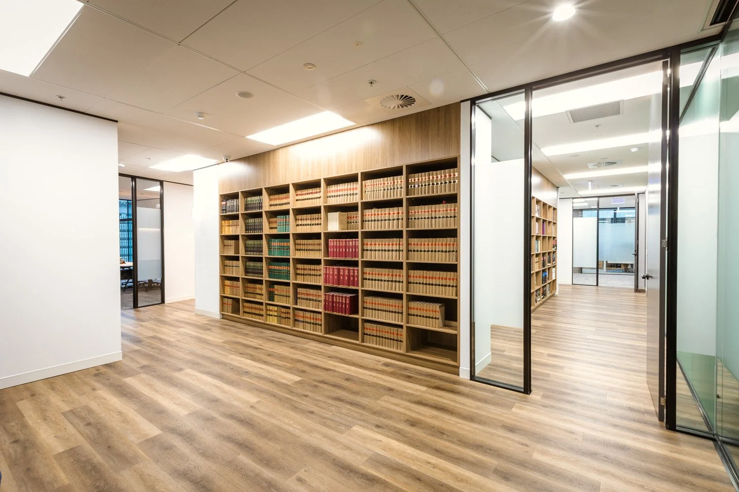 Tucker & Cowen Office Fitout | Legal Office Interior Design Brisbane

This Tucker & Cowen office fitout showcases a contemporary legal workplace featuring custom timber joinery, integrated legal library shelving, and frameless glass partitioning. War