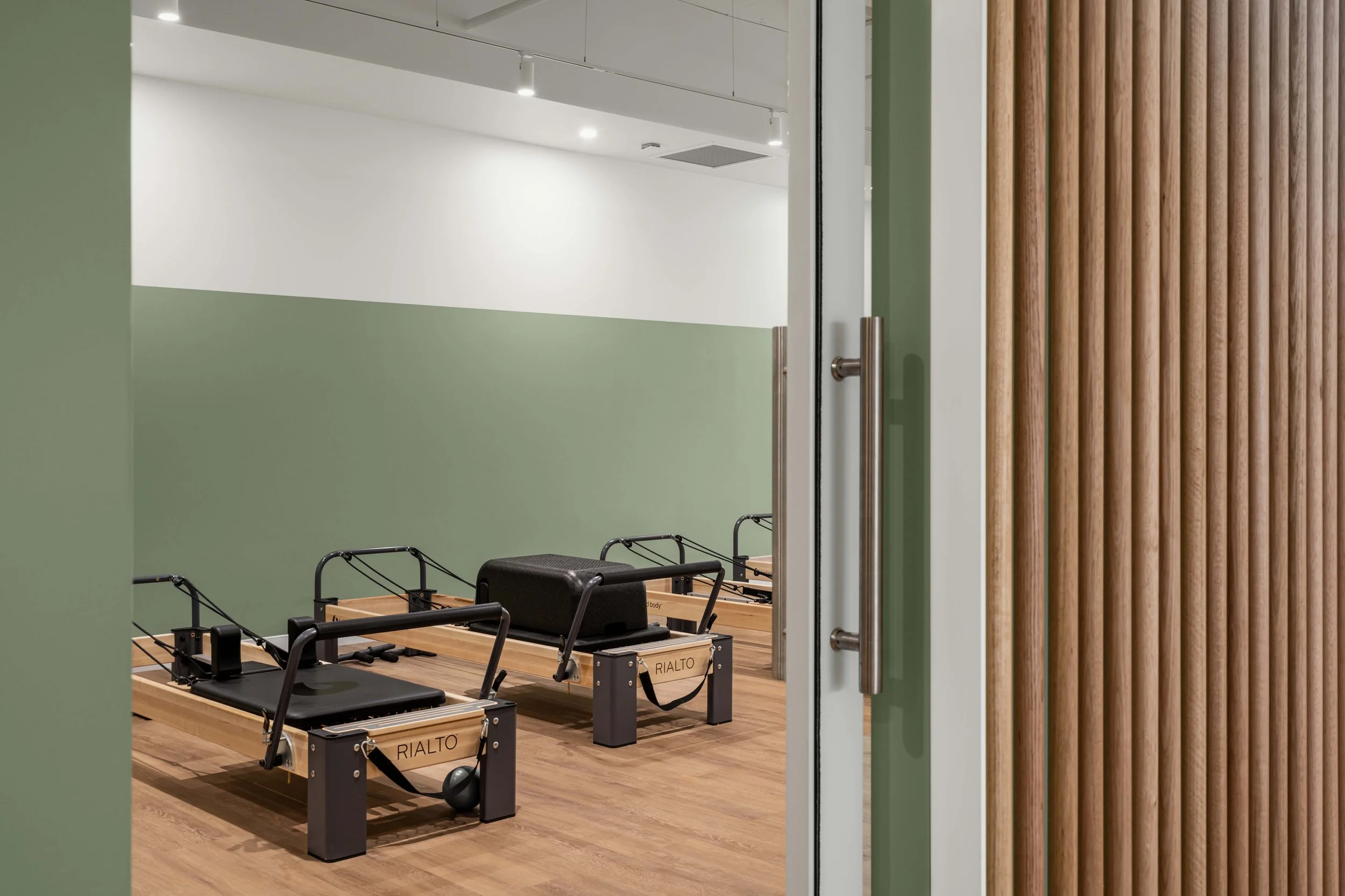 Premium Pilates Milton | Pilates Studio Interior Fitout Brisbane

This Premium Pilates Milton studio showcases a contemporary wellness interior designed to support movement, comfort, and client experience. The space features reformer Pilates equipmen
