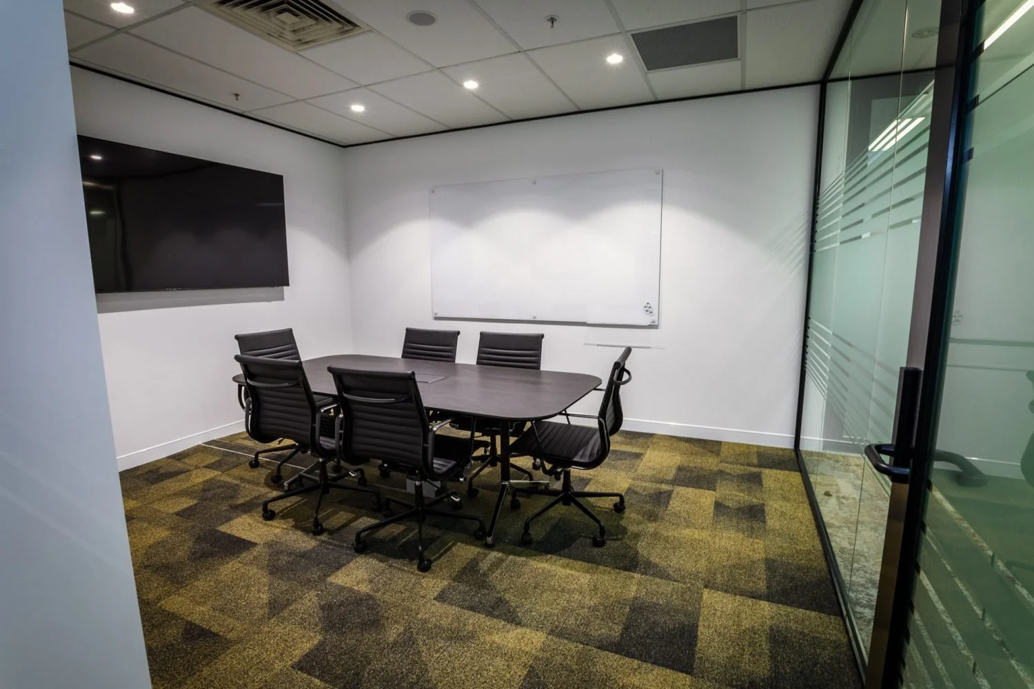 Premise Office Fitout | Conference Room Design Brisbane

This Premise office fitout features a contemporary conference room designed to support meetings, presentations, and workplace collaboration. The space incorporates a black meeting table, ergono