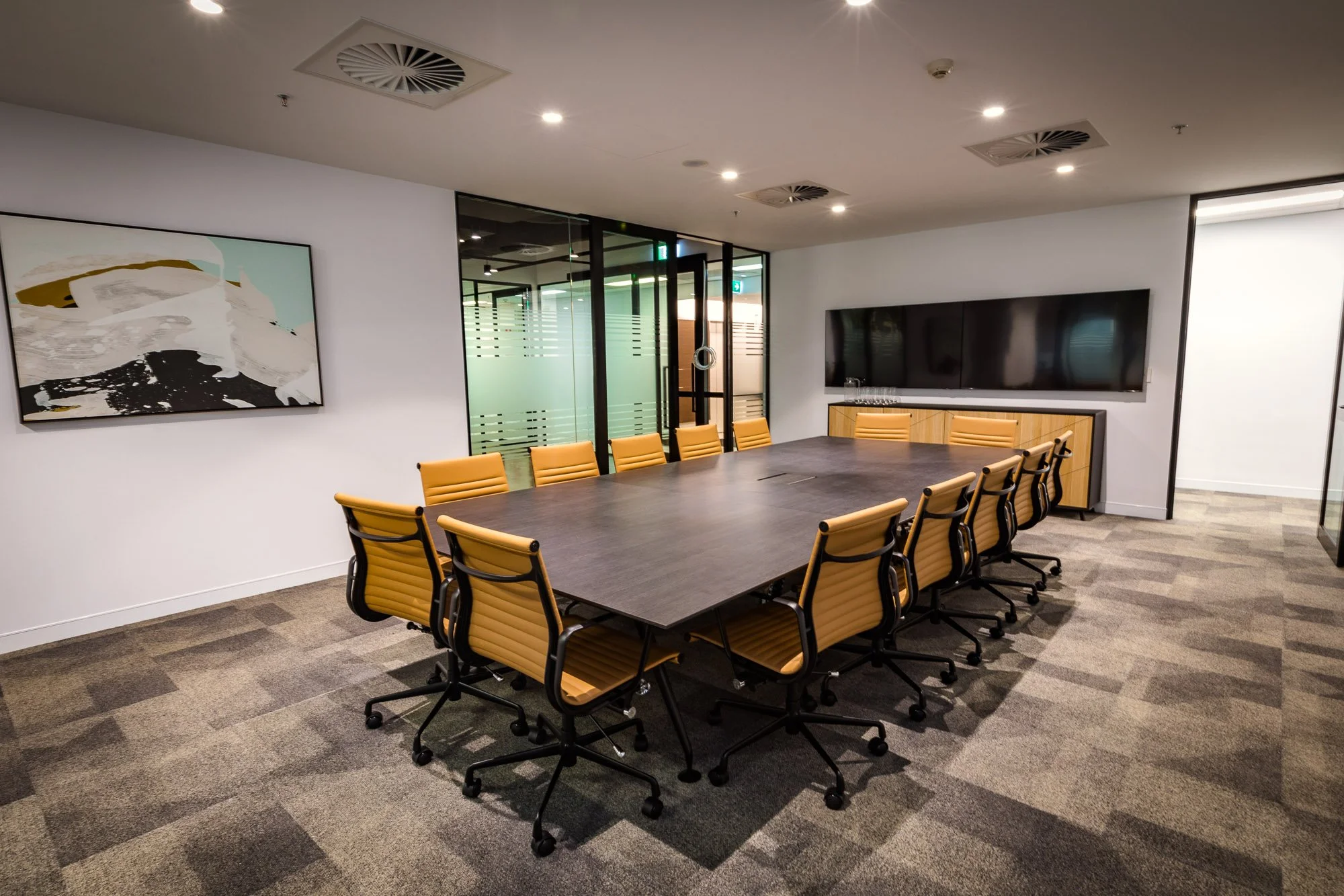 Premise Office Fitout | Executive Boardroom Design Brisbane

This Premise office fitout features a contemporary executive boardroom designed to support meetings, presentations, and collaboration. The space incorporates a large conference table, ergon