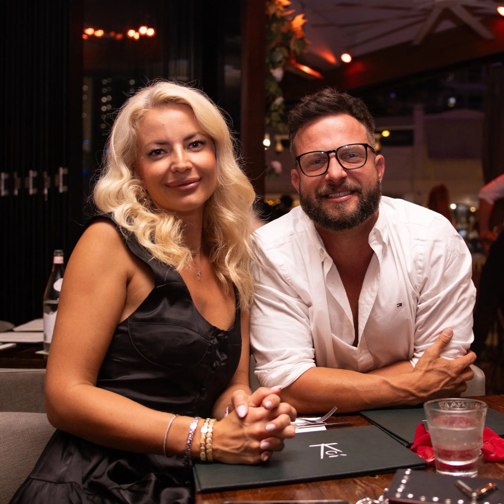 Couple smiling and enjoying Valentine’s Day at Koi Dining in Broadbeach