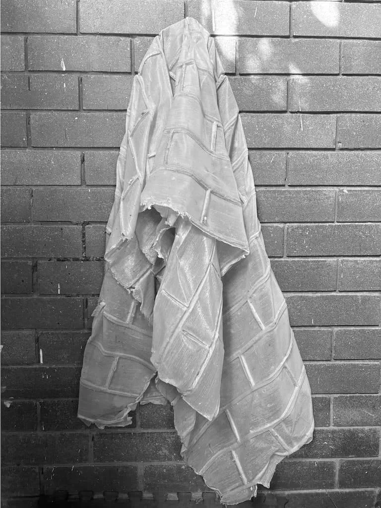 Condon often explores the softness of materials in contrast to the hardness and rigidity of building structures.