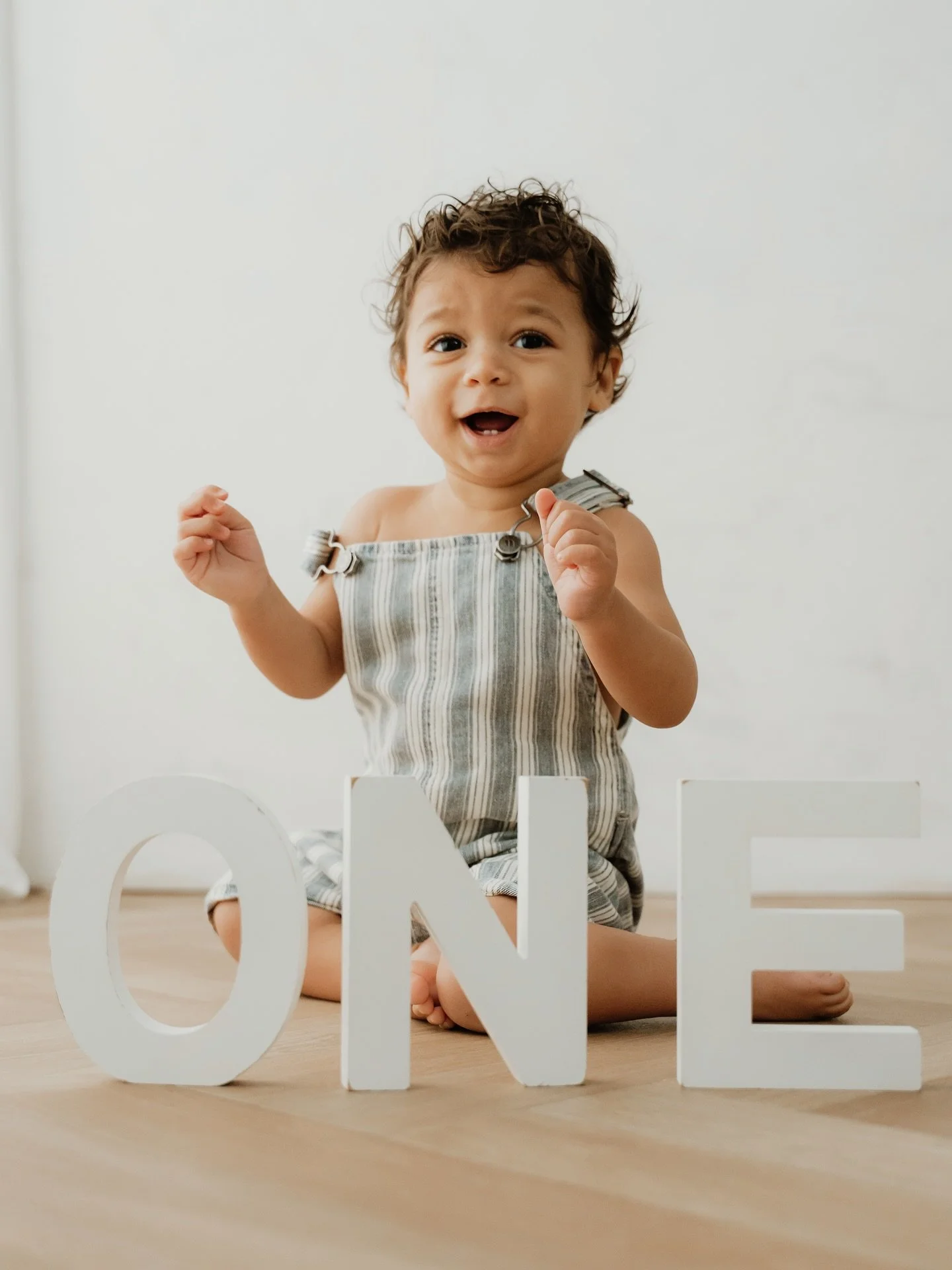Zay, having an absolute blast for his first birthday photoshoot (including my favourite photo of him mid topple backwards!). The last two photos are of Zay&rsquo;s older brother Kyro who came in for his first birthday shoot in 2024.  I can&rsquo;t be