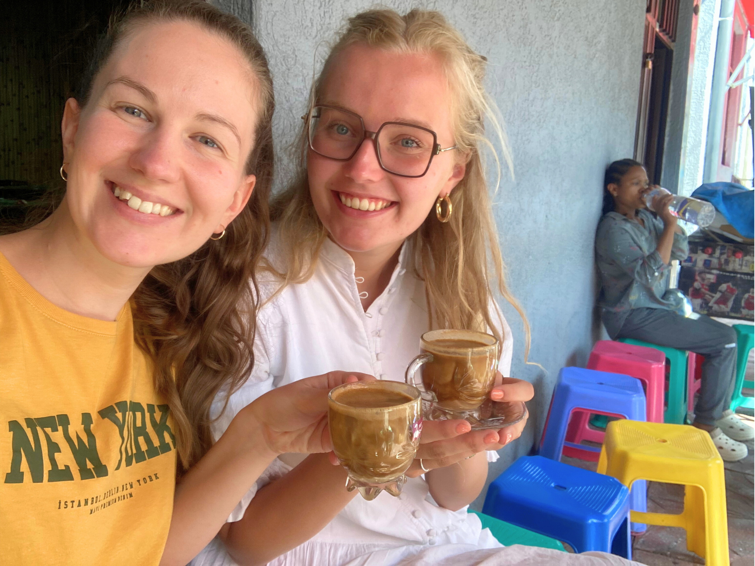 Drinking peanut coffee with another intern from the Netherlands