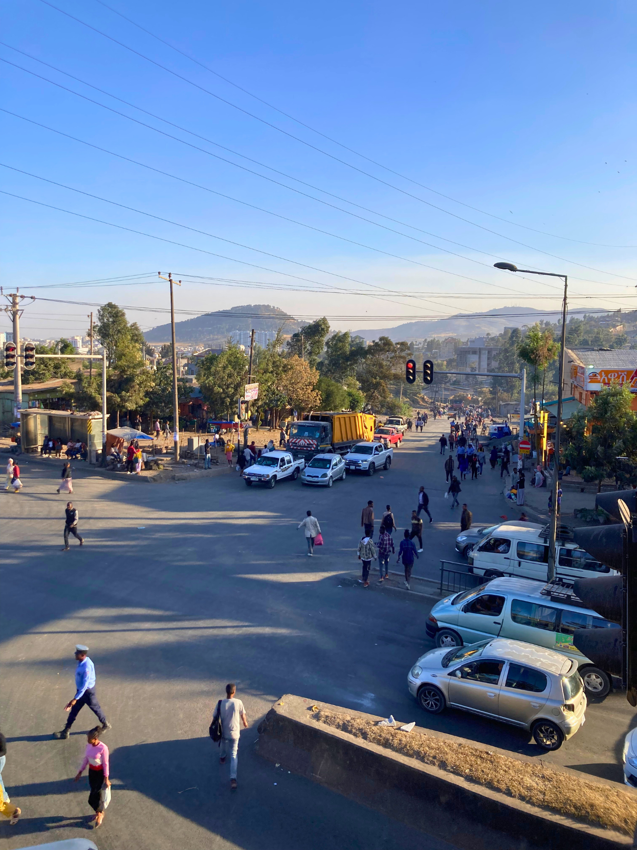 There are more people on the street than cars