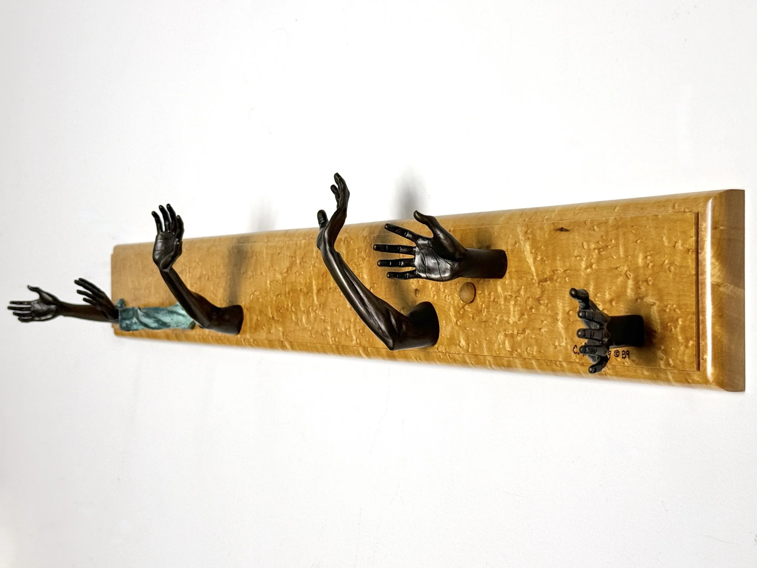 vintage mid century modern detroit michigan american studio craft birdsye maple wall mounted coat rack hook surrealist bronze hands wall hooks carl aubock unique rare vintage objects