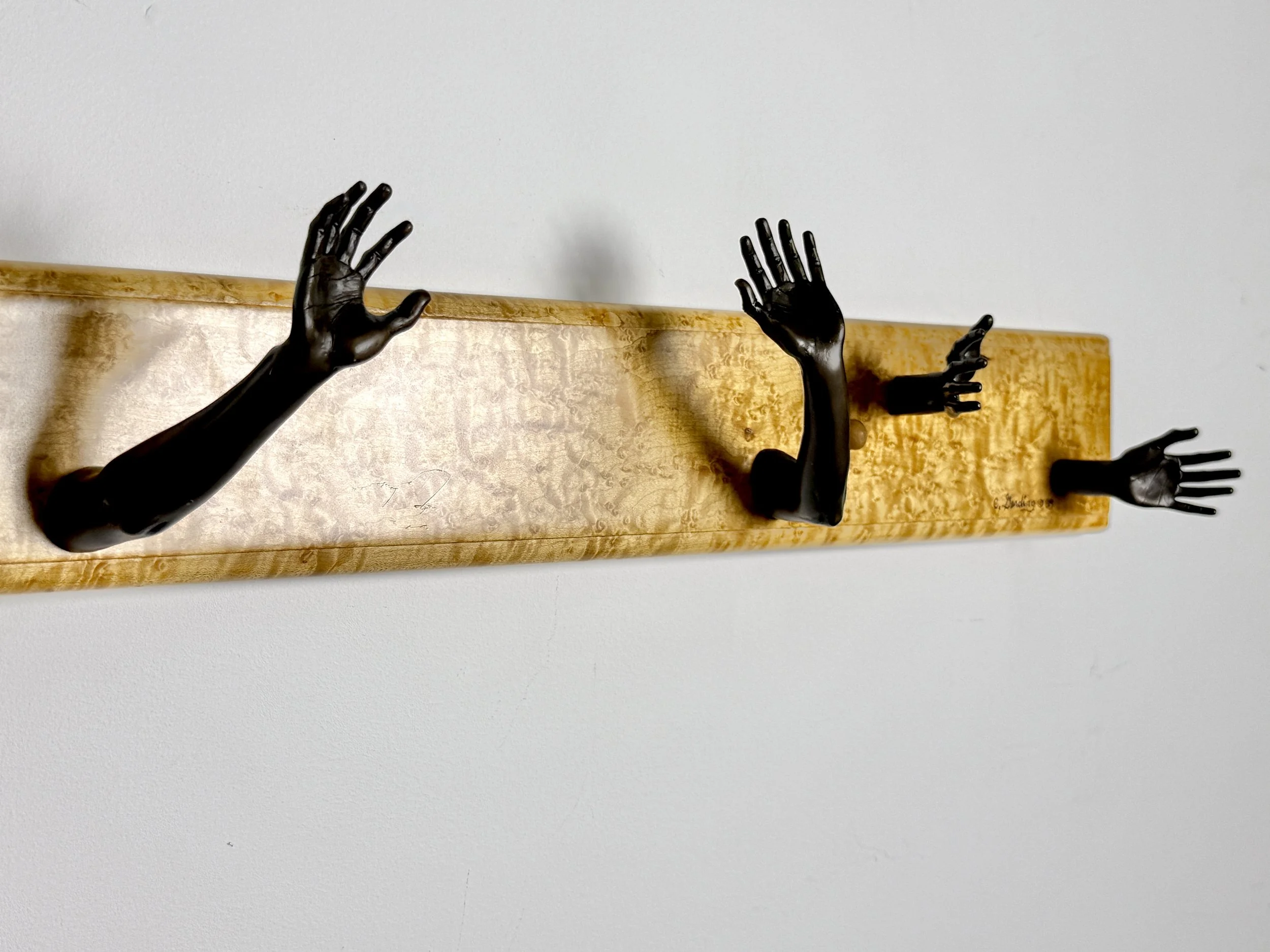 vintage mid century modern detroit michigan american studio craft birdsye maple wall mounted coat rack hook surrealist bronze hands wall hooks carl aubock unique rare vintage objects