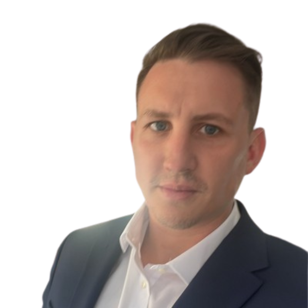 Portrait of a man in a suit with a white shirt, against a white background.