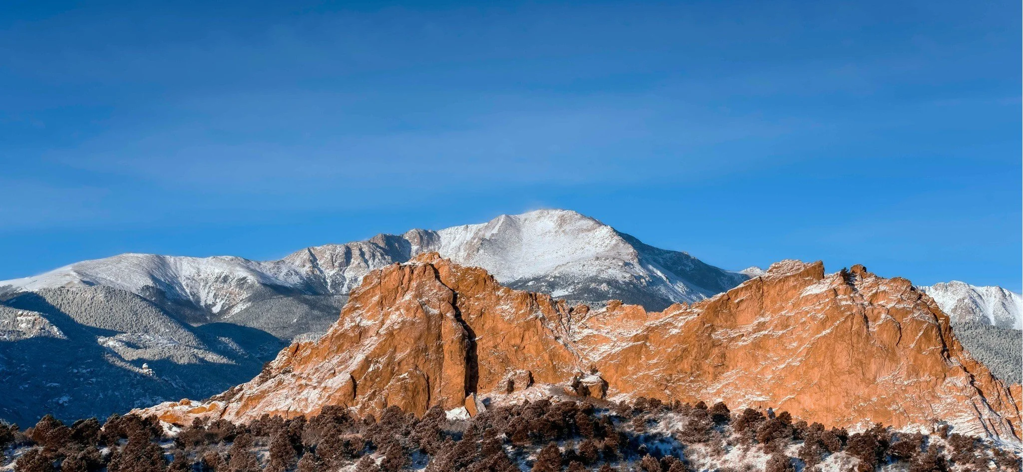 Pikes Peak in Colorado Springs with Garden of the Gods in the foreground