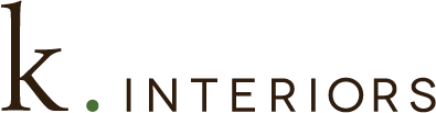 Logo for K Interiors with a black background, brown lettering, and a small green dot.