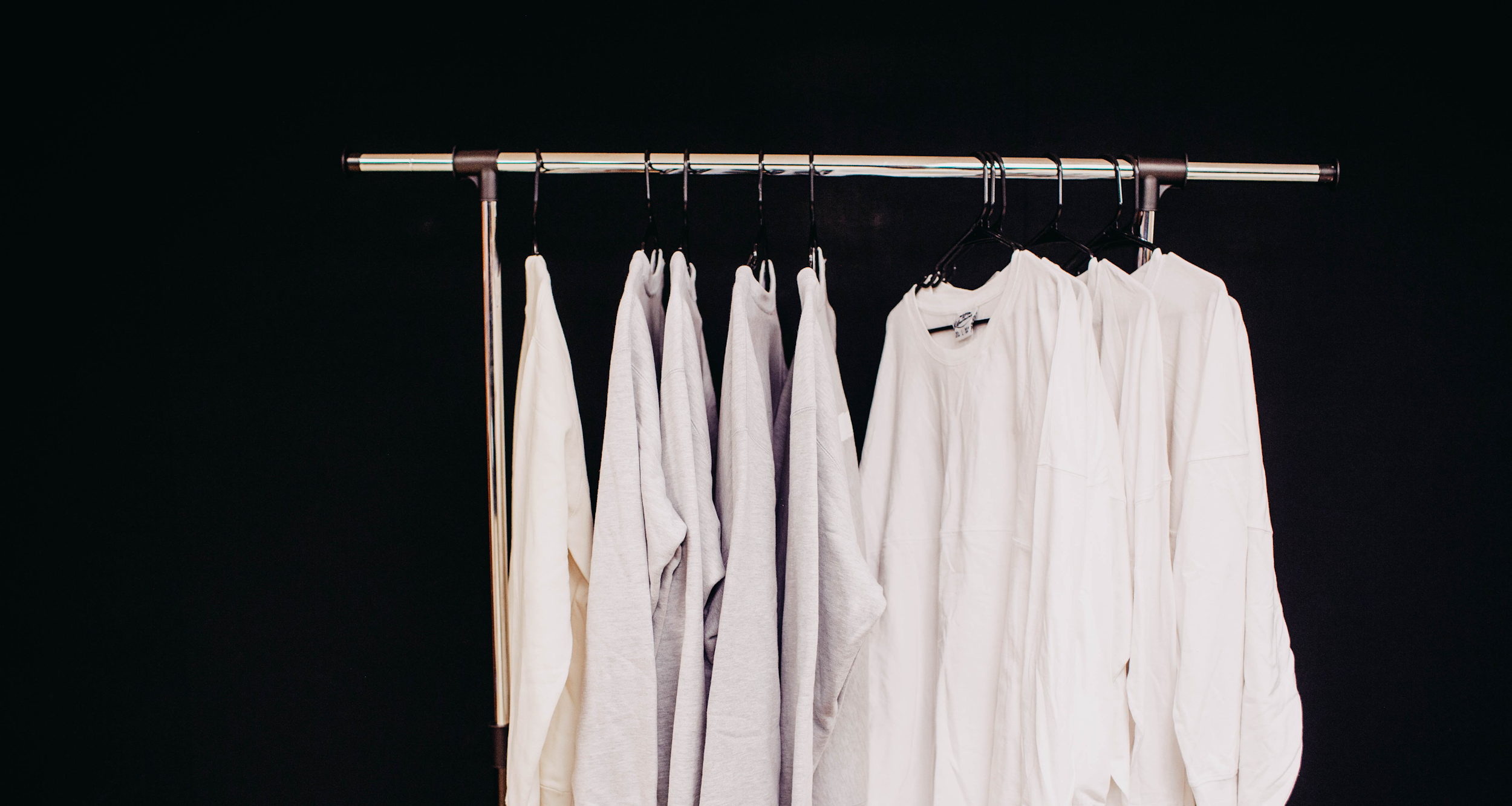 white blank shirts hanging custom design