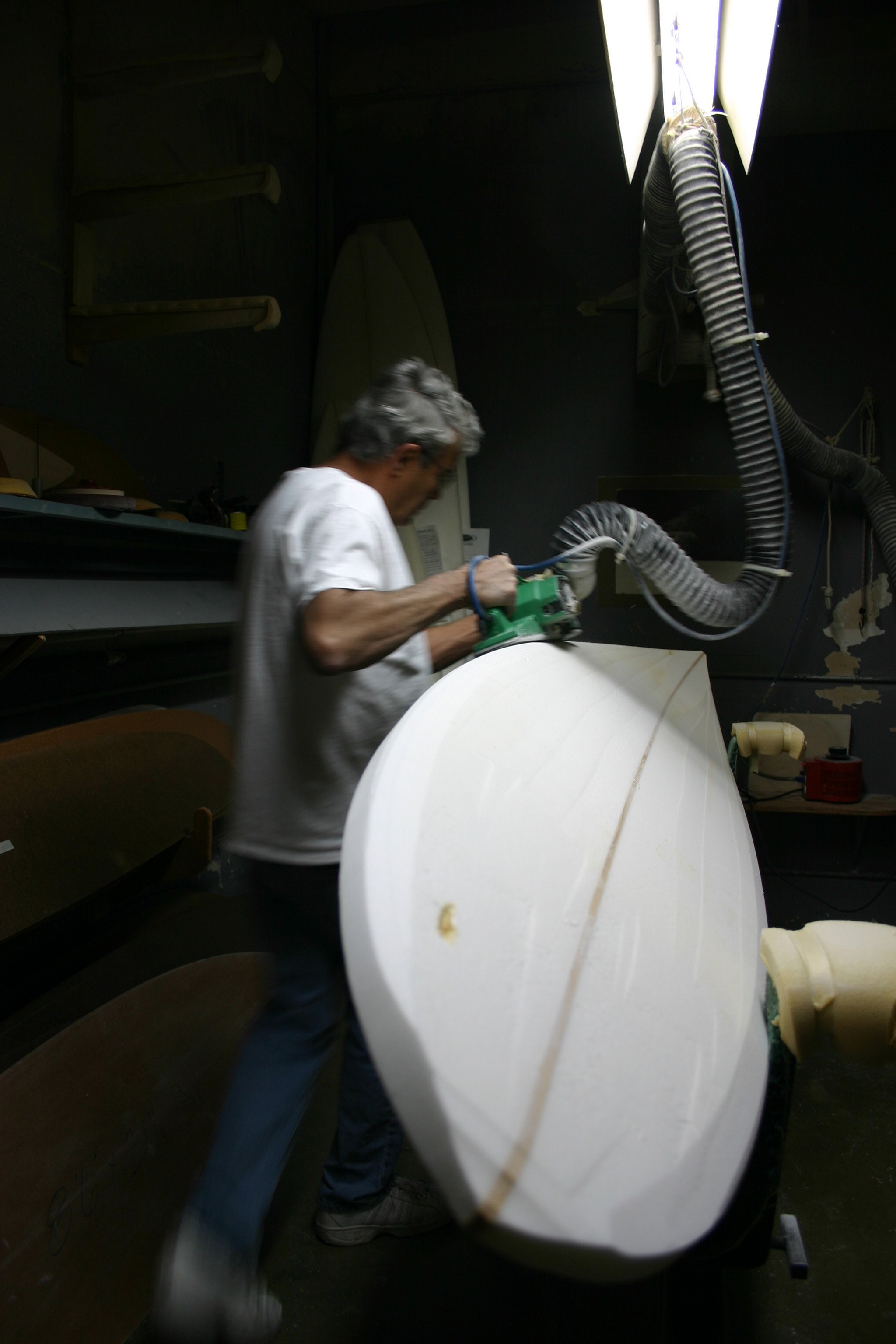 Bruce Jones shaping a surfboard