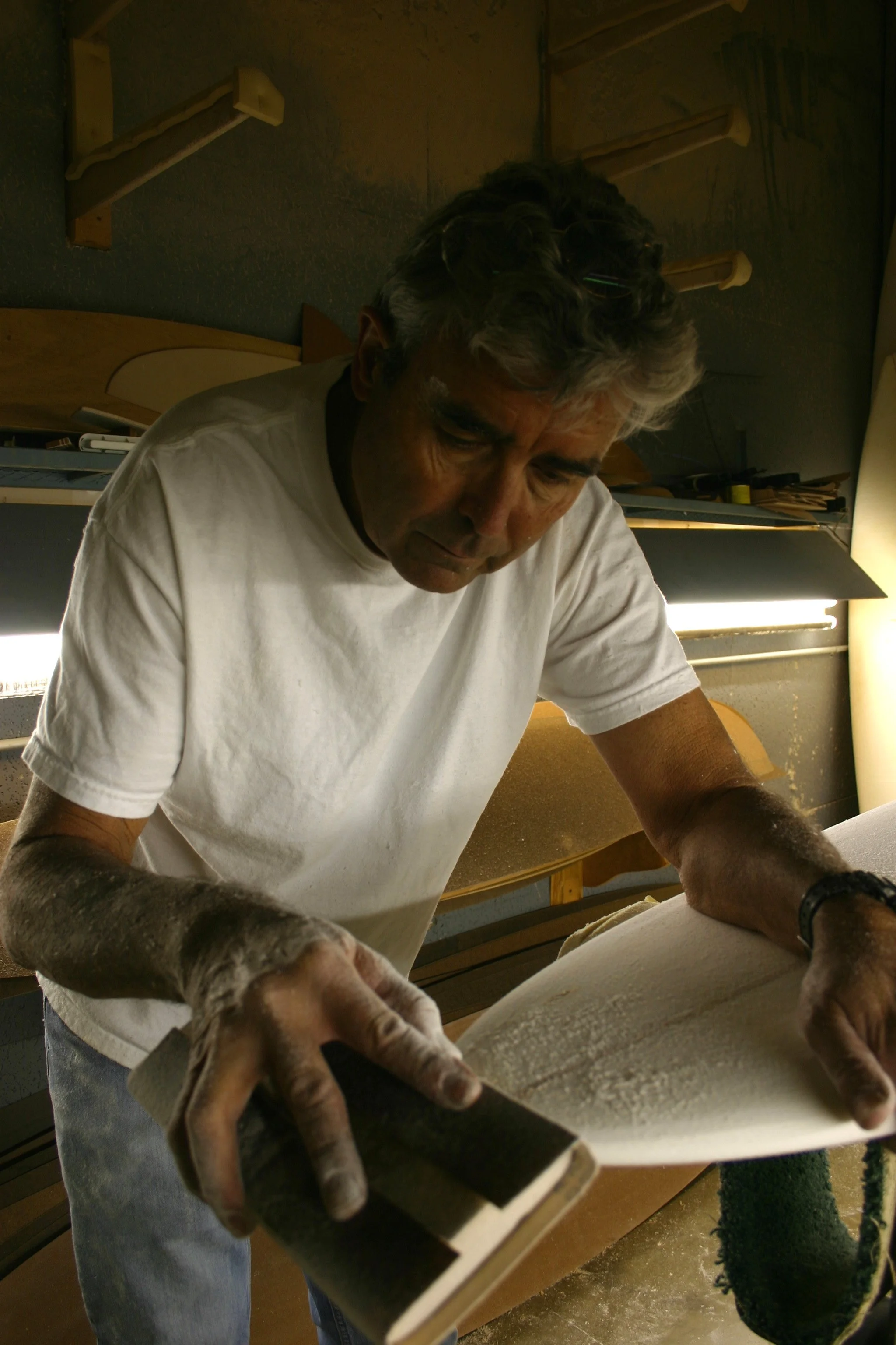 Bruce Jones shapign a surfboard