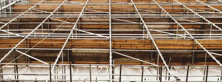 Scaffolding surrounding a construction site.