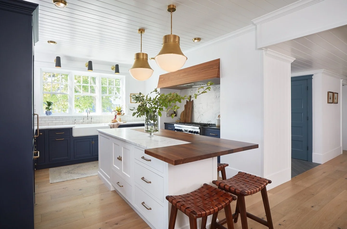 A century of renovations had taken The Sip &amp; Ski Lodge far from its roots. We reimagined the layout, relocating the kitchen to the heart of the home, restoring original details like the staircase and pocket door, and bringing back its historic ch