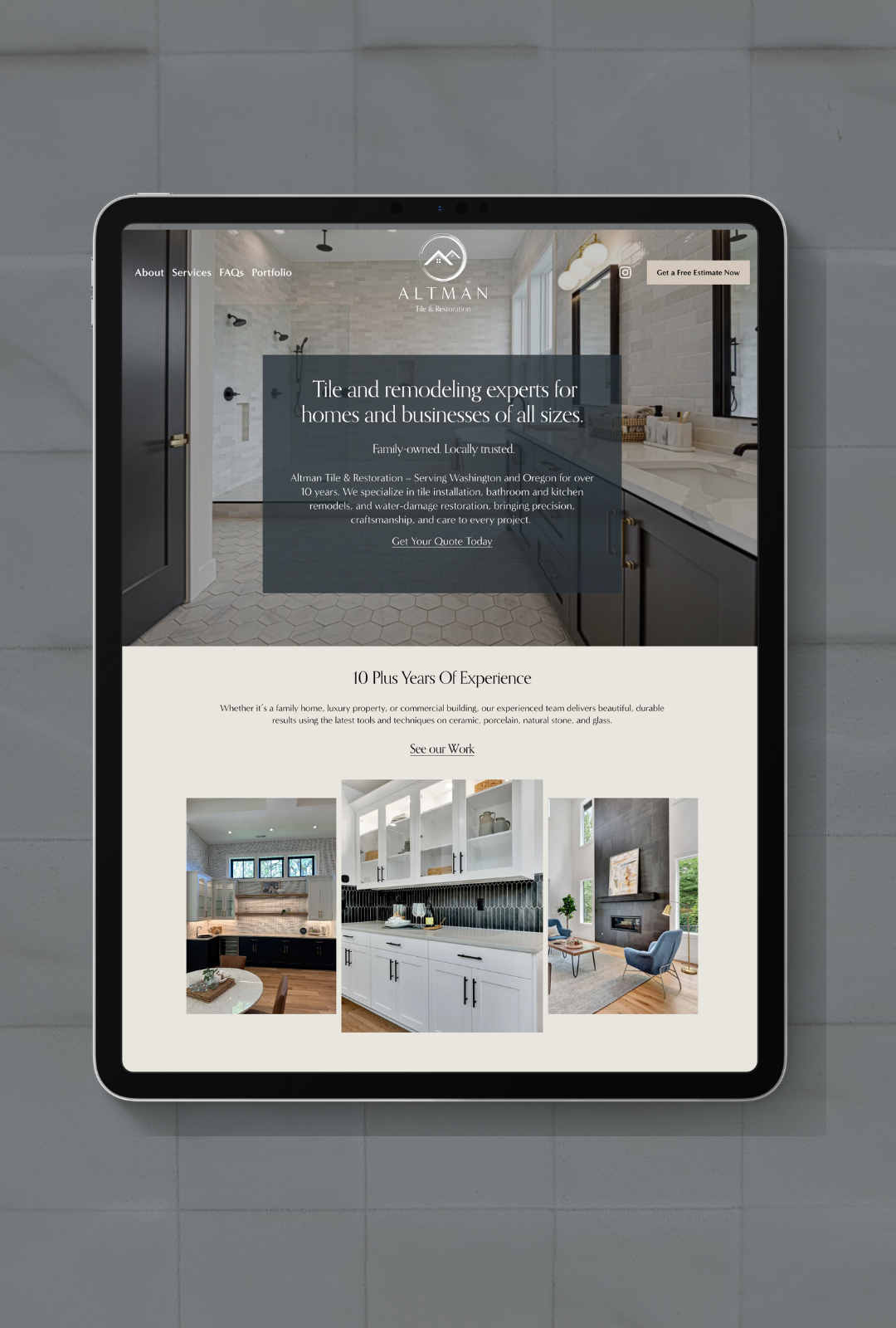 Tablet displaying a website for Altman Tile & Restoration, showing a bathroom interior, with text about tile and remodeling services, and images of interior spaces like a kitchen and living room.