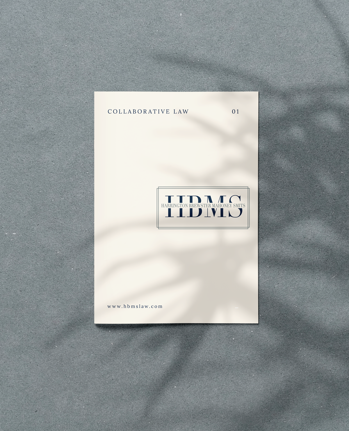 Cover of a brochure on collaborative law by HBMS, Harrington Brewster Mahoney Smits, on a textured gray surface. Website: www.hbmslaw.com.