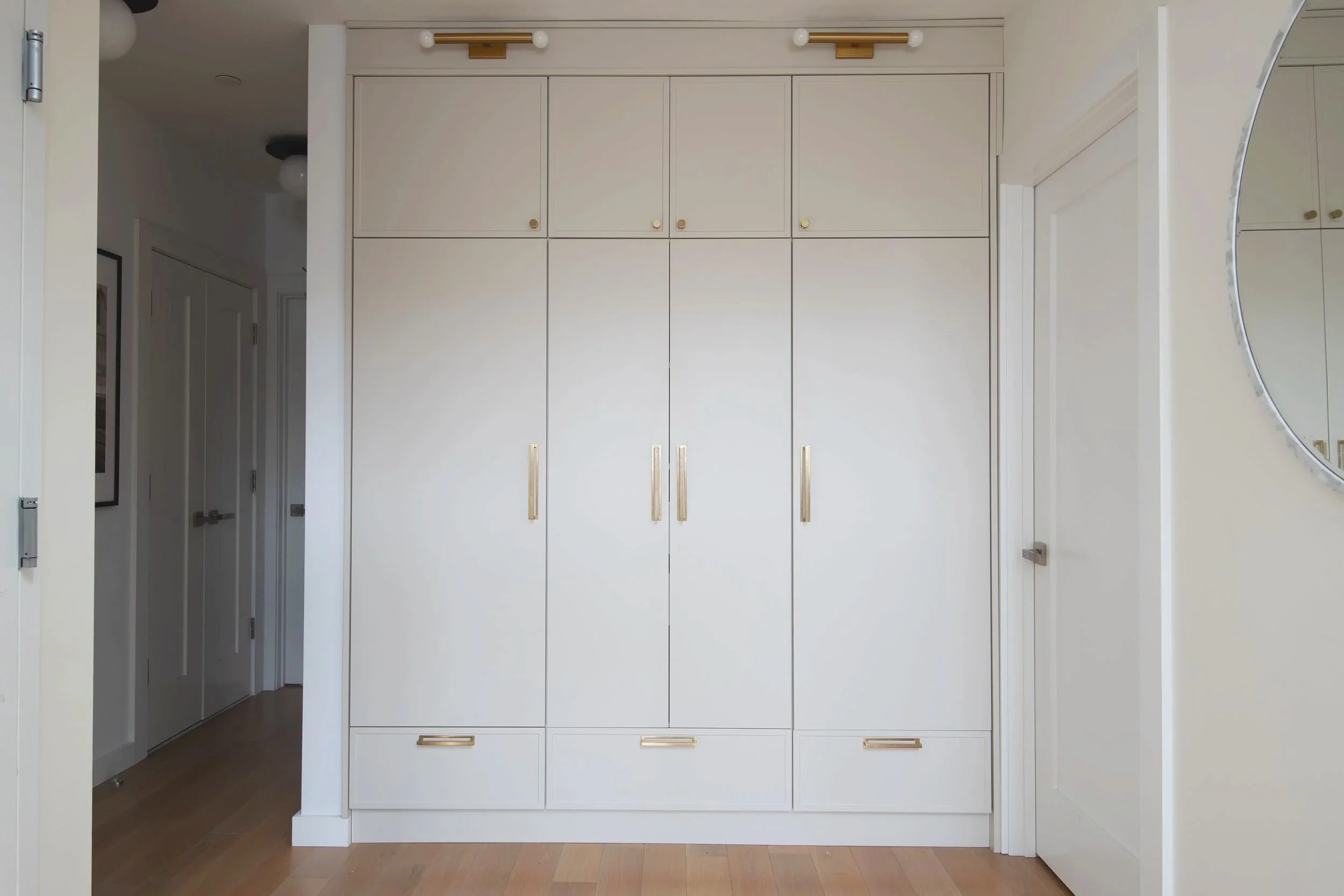 Built-in Closet from Ikea Sektion Cabinets and Semihandmade Doors