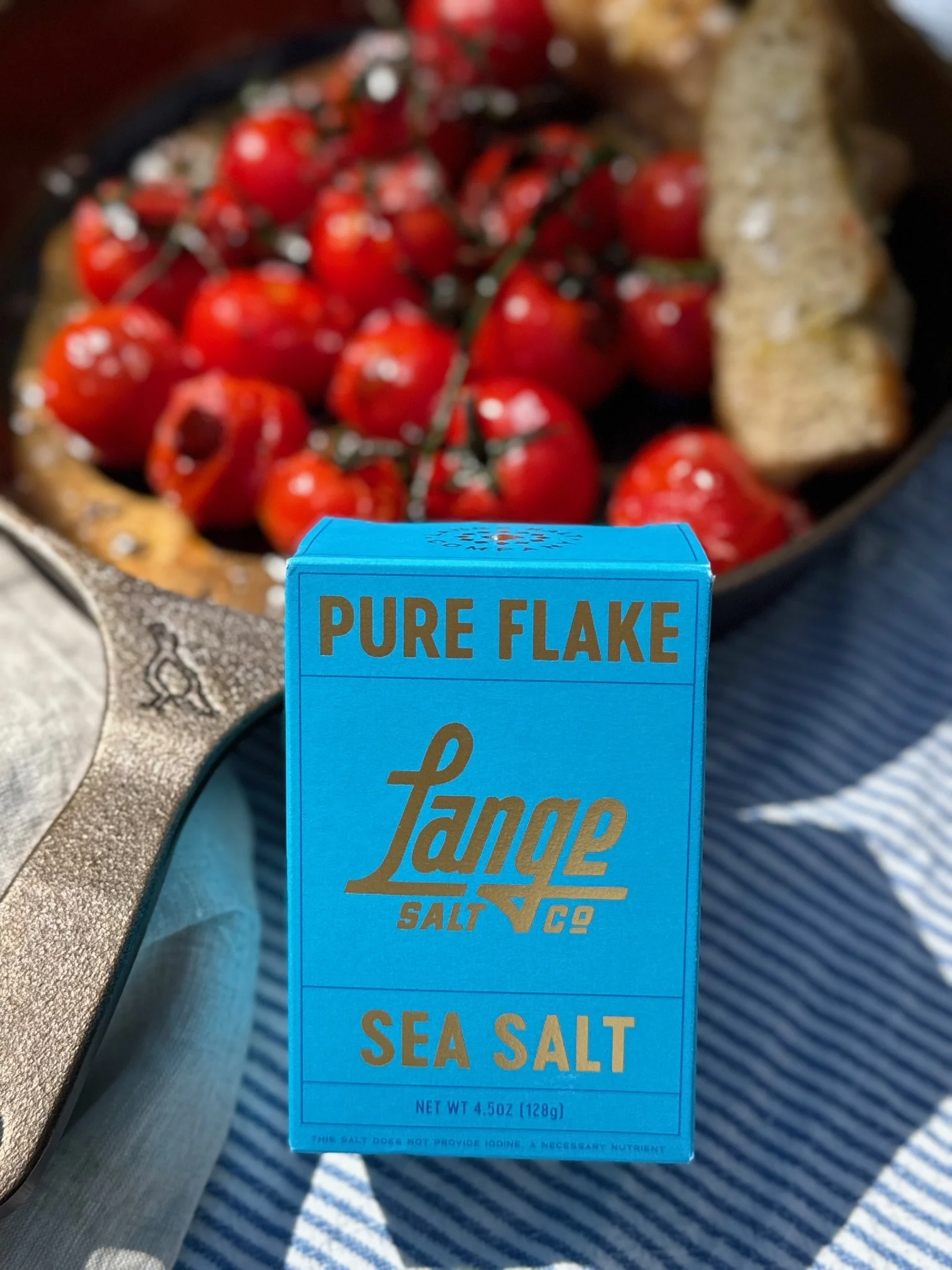 Smithey No. 12 Skillet, Blistered Tomatoes recipe finished with Lange Salt co.  Pure Flake Sea Salt