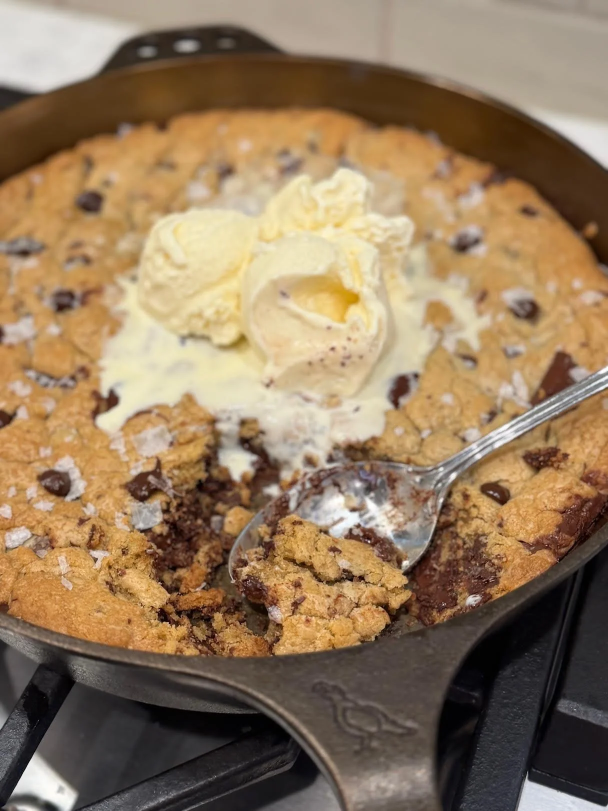 Chocolate Chip Cookie in Smithey's No. 12 Skillet, finished with Lange Salt Co. Pure Flake Sea Salt