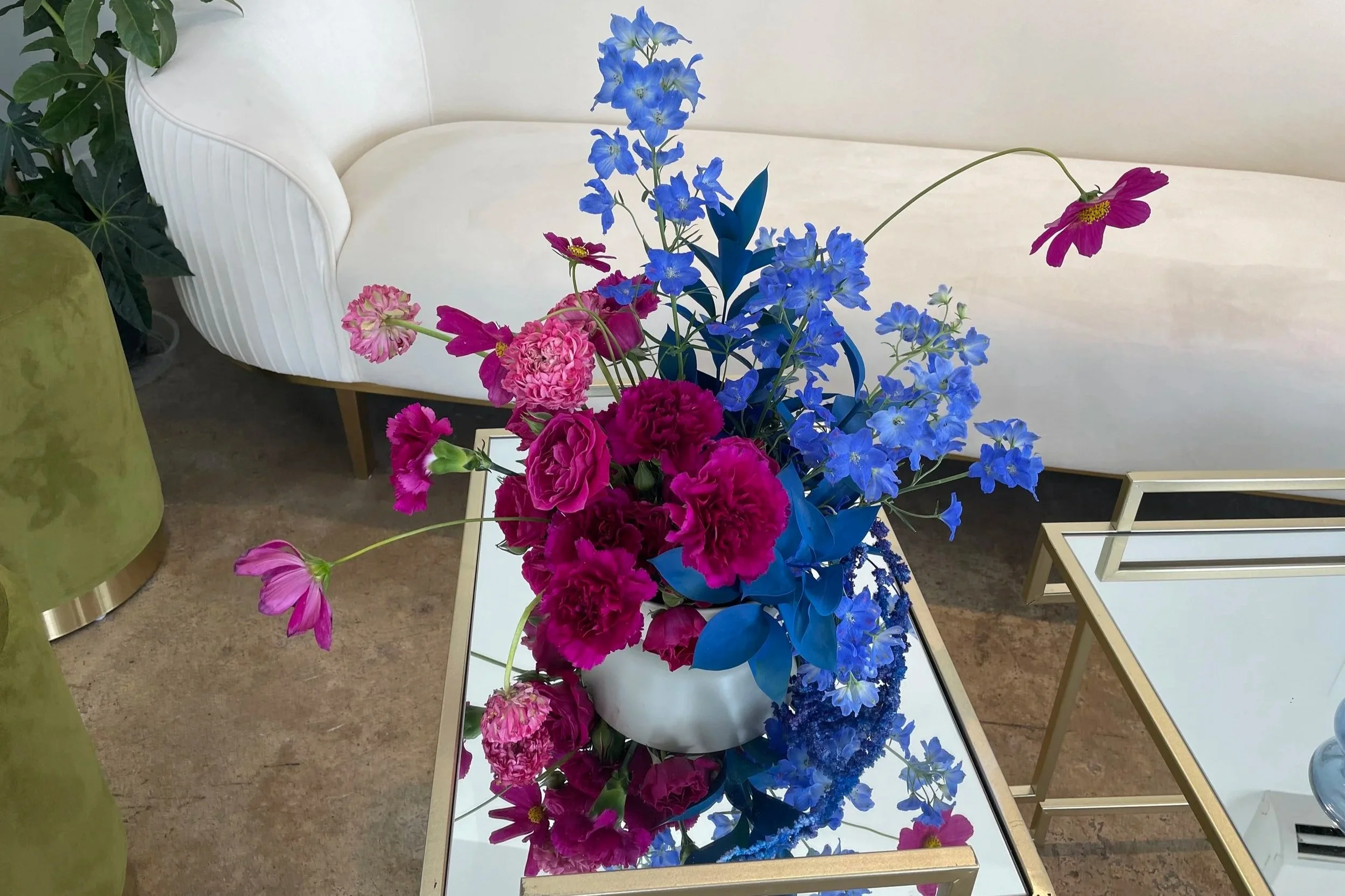 Flowers on a table before a wedding begins at Mica Studios