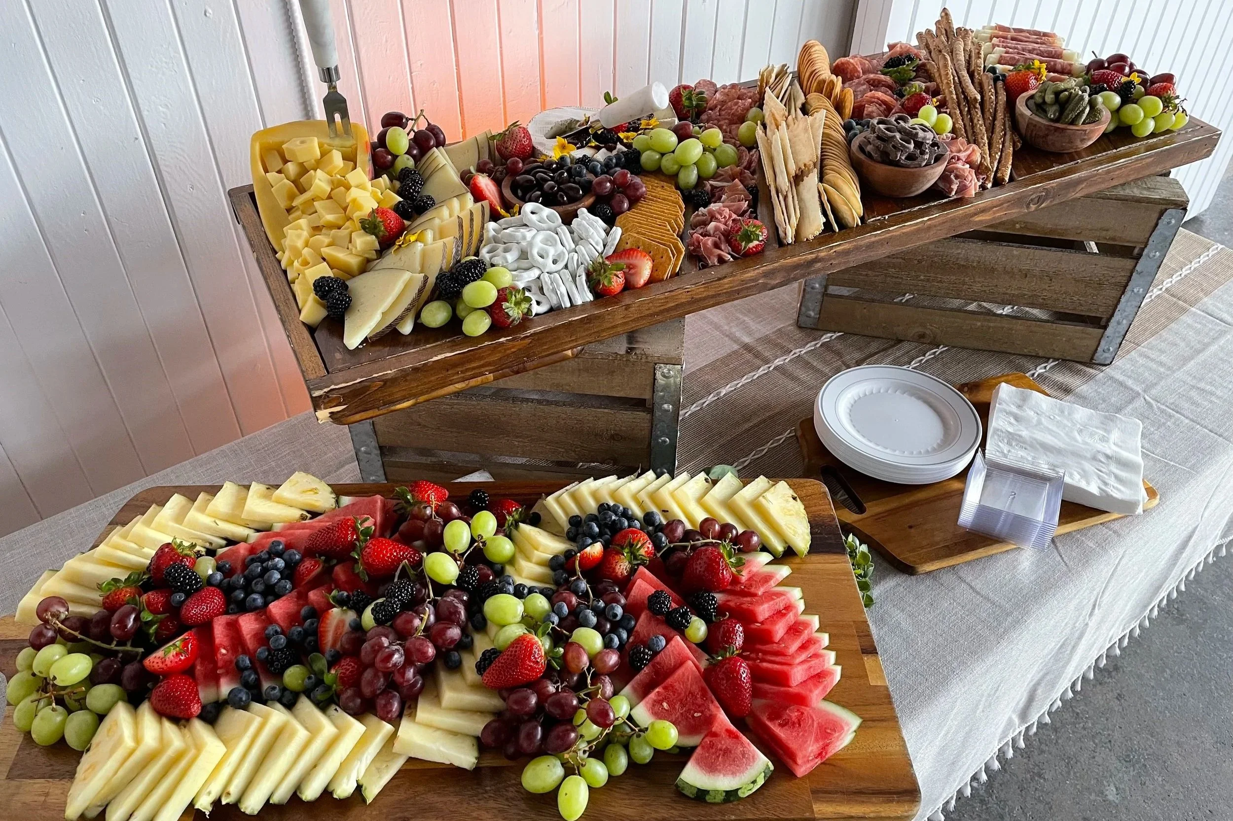 An external vendor creates a food spread for a wedding at Mica Studios