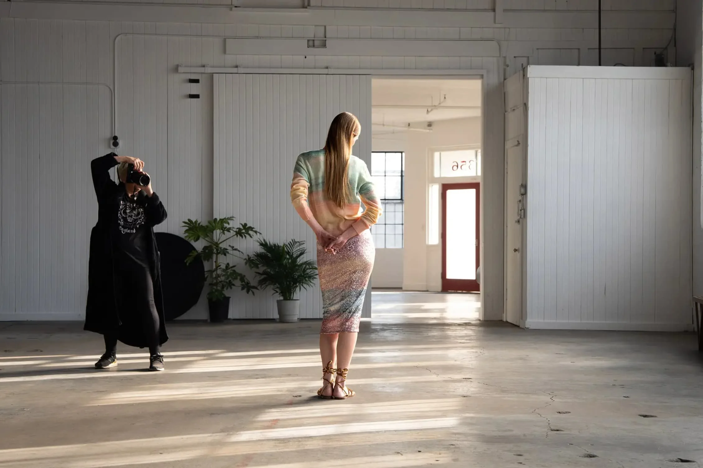 A model being photographed in one of the daylight studios at Mica