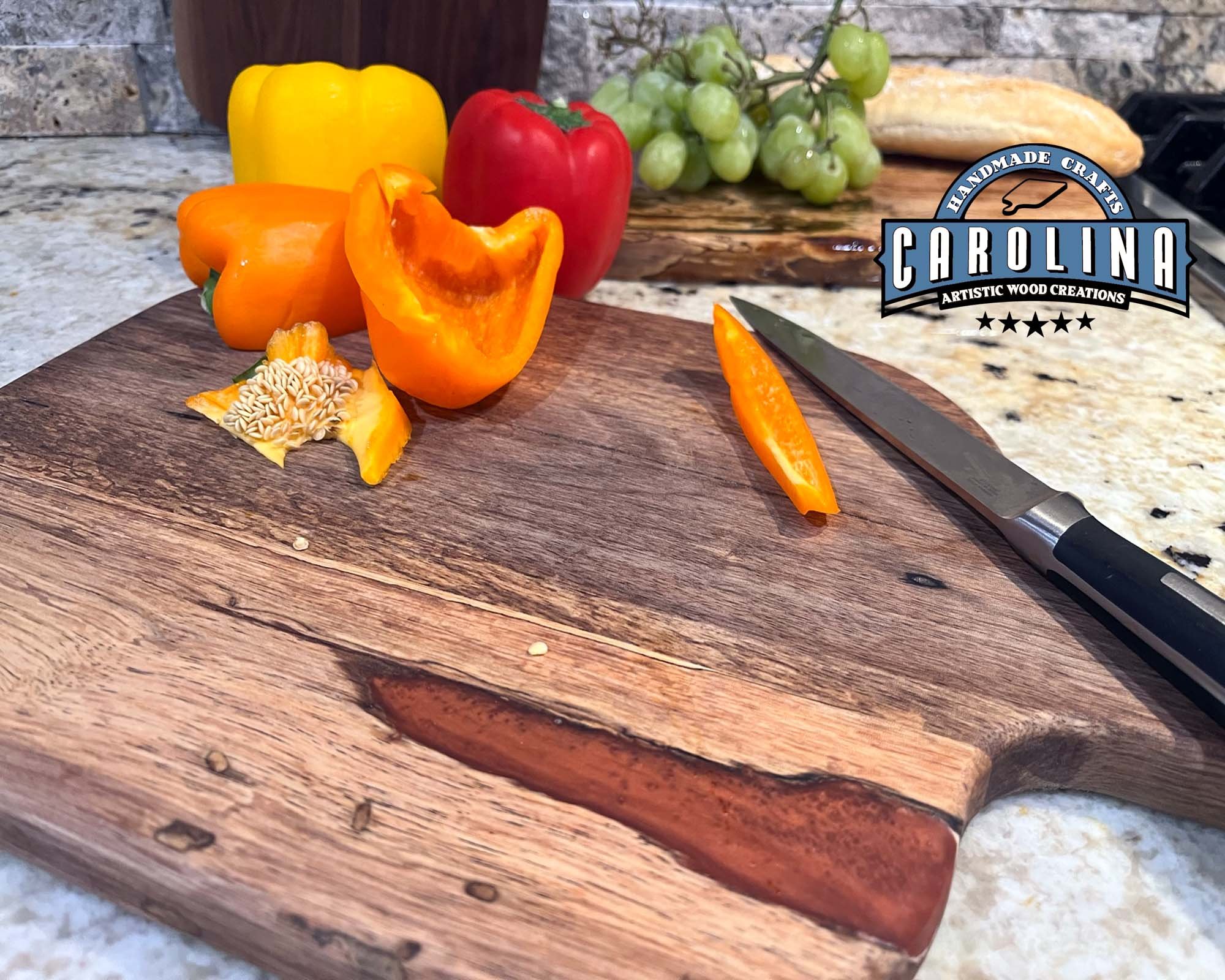 charcuterie-board-cutting-board-walnut-orange-epoxy-handle-top-veggies.jpg