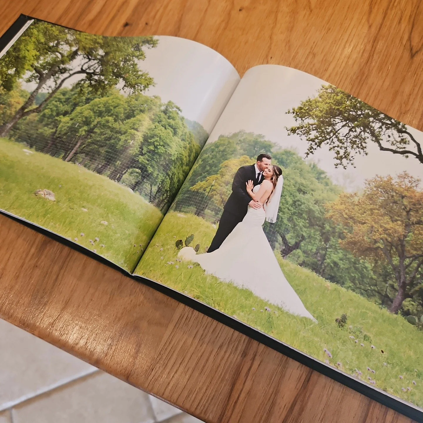 We love scrolling through past clients' wedding albums. What an amazing day in Kendalia, Texas. #wedding #weddingalbum #texashillcountry #ido #austintexaswedding @megankristine87