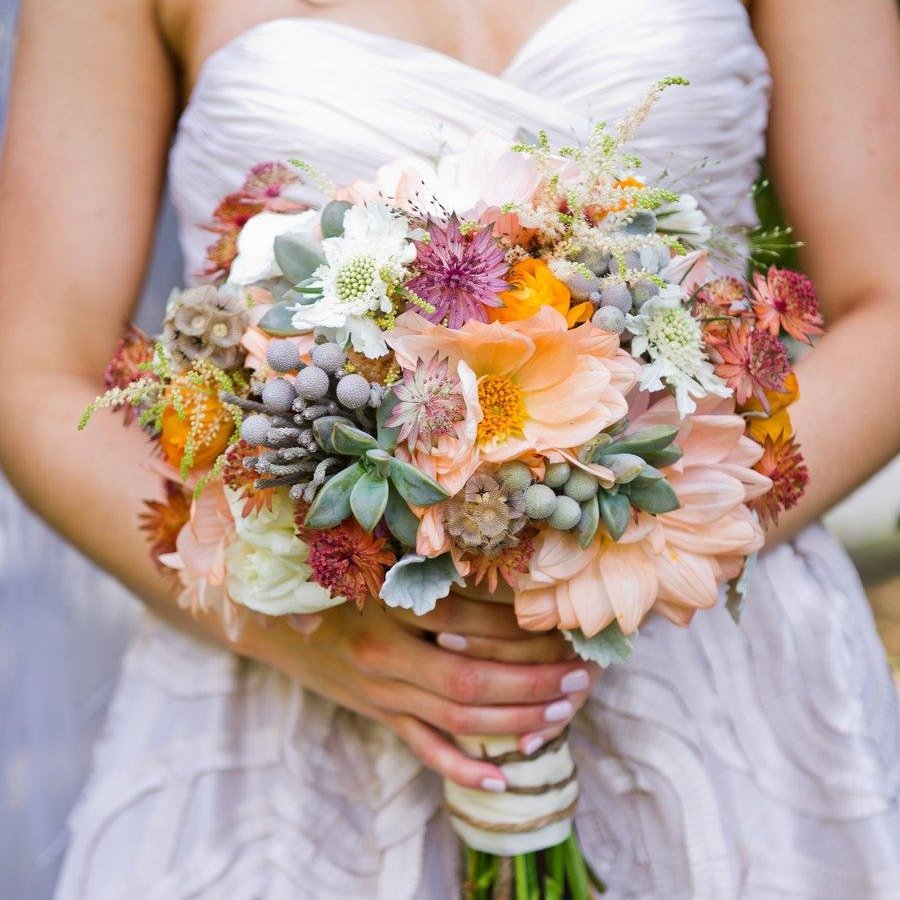 For this vision, we&rsquo;d blend the warmth of a rustic setting with the elegance of thoughtful design&mdash;wildflowers gathered with an effortless, just-picked feel, natural wood, soft candlelight, textured linens, and beautiful understated detail