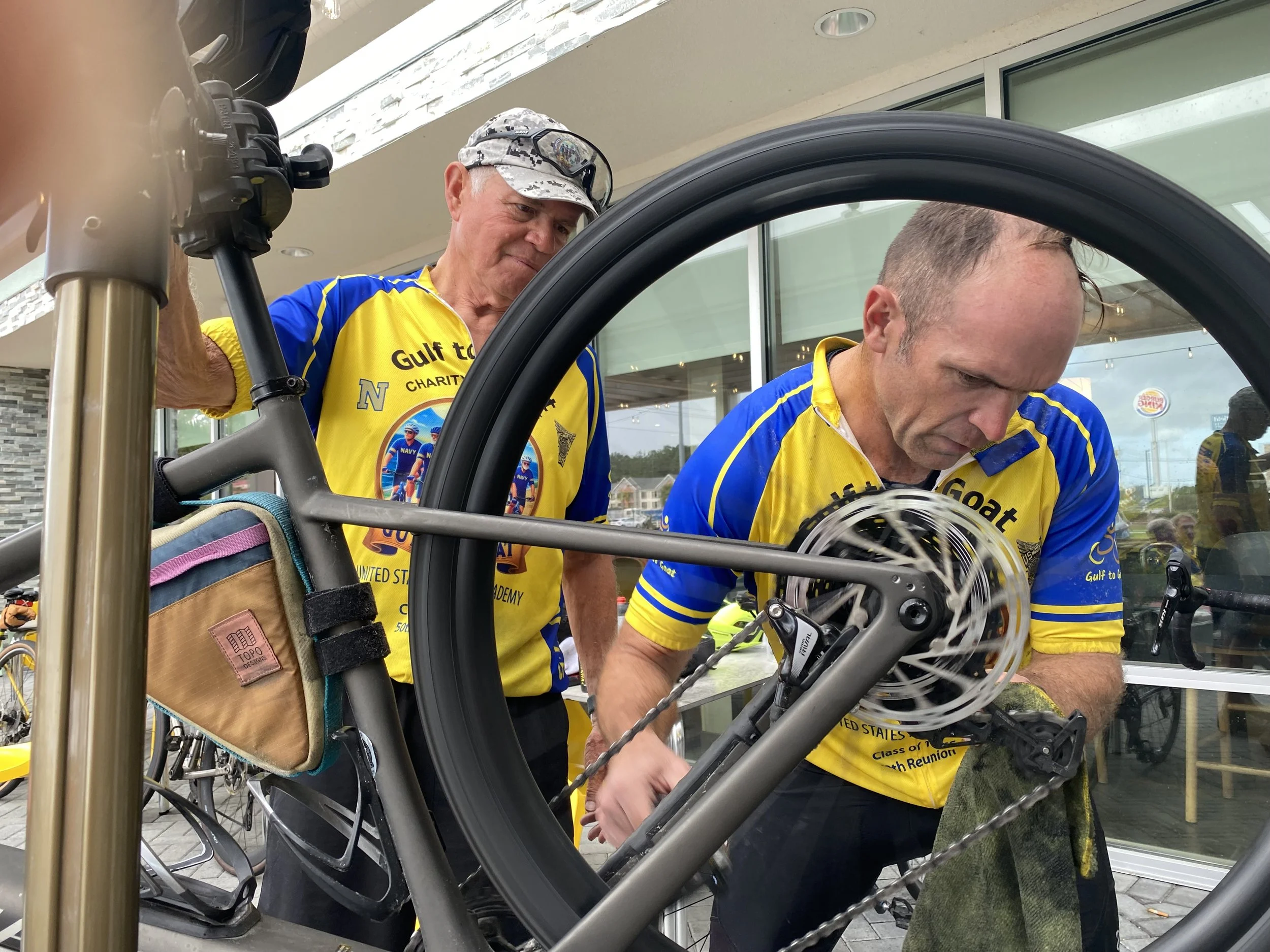 Mike Donnelly cleaning bikes after the ride
