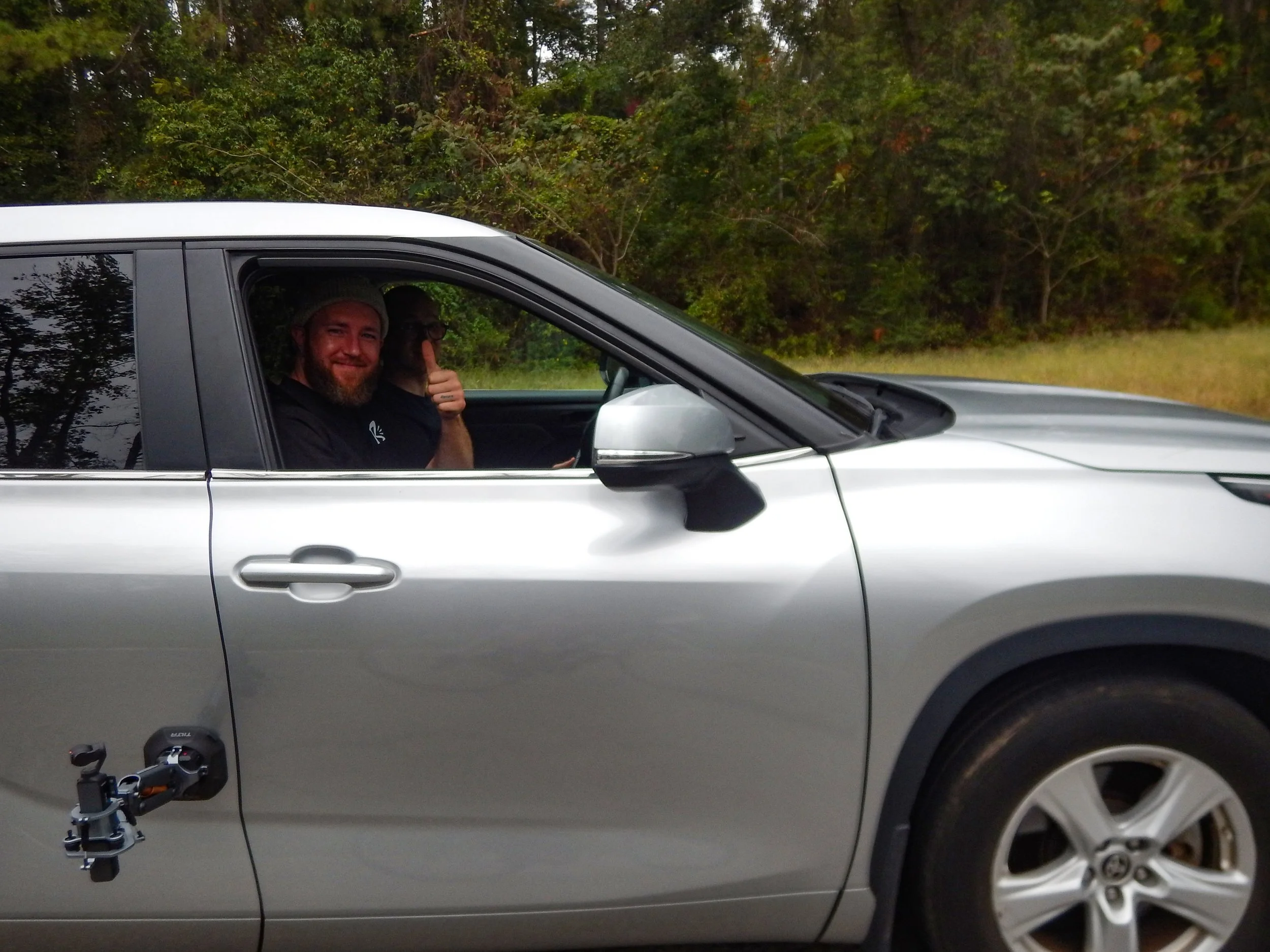 Our photo crew with a special camera mount on the car door