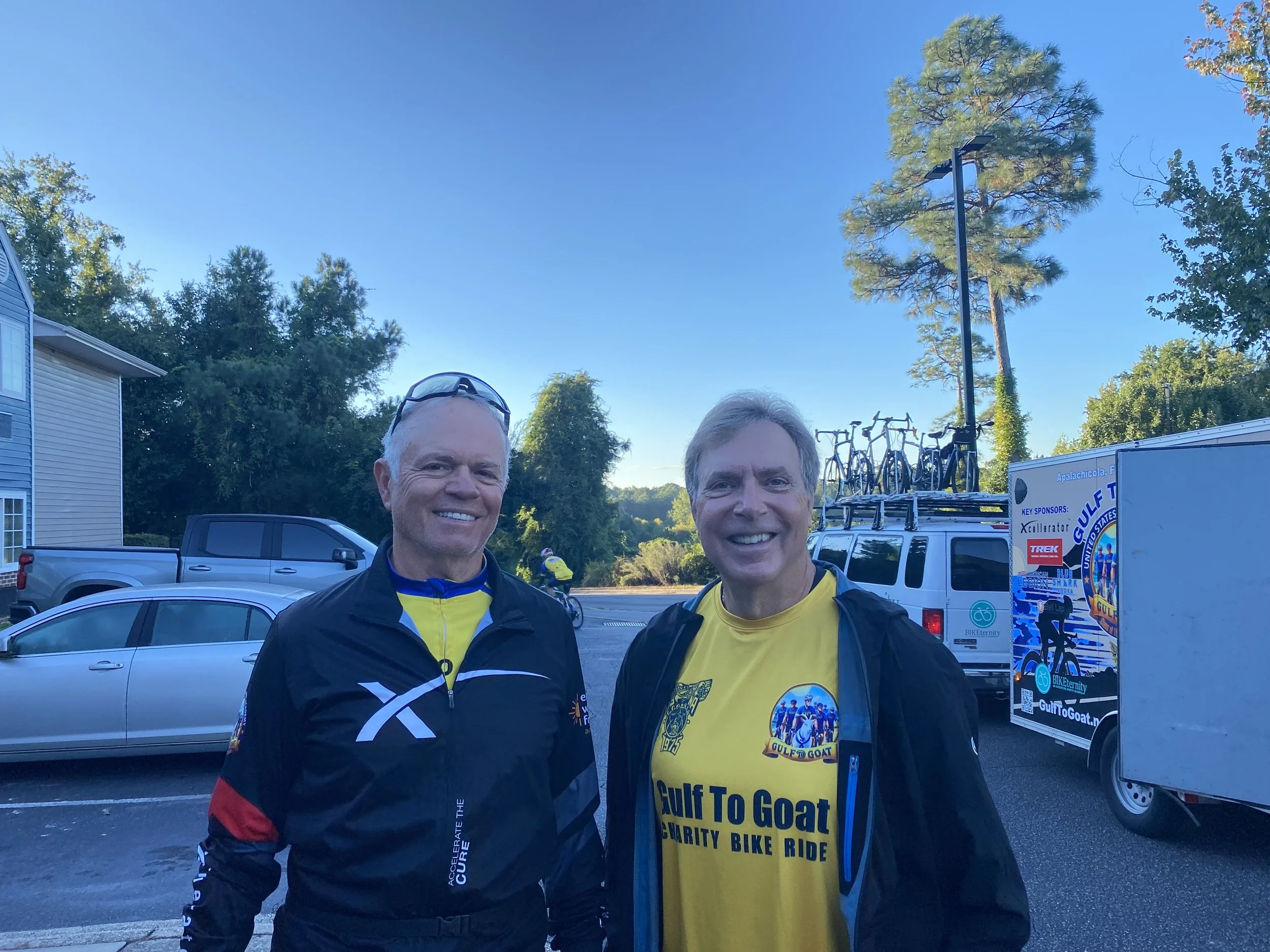 Mike M. and Chuck standing eye-to-eye