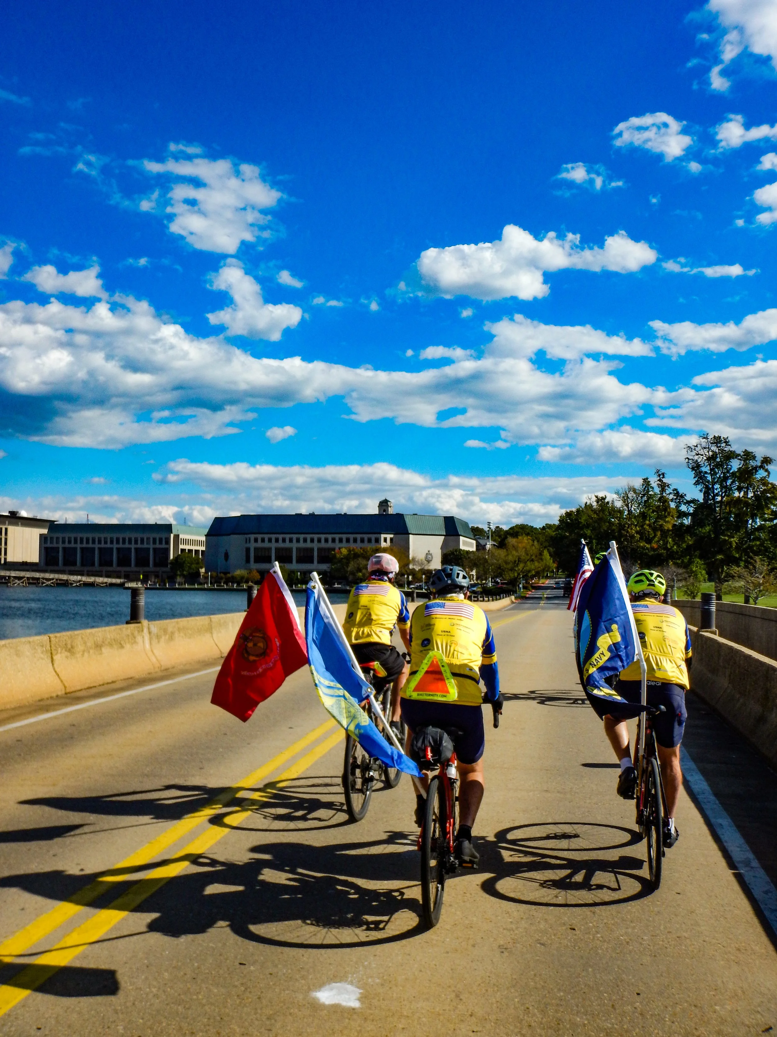 Flag bearers crossing College Creek