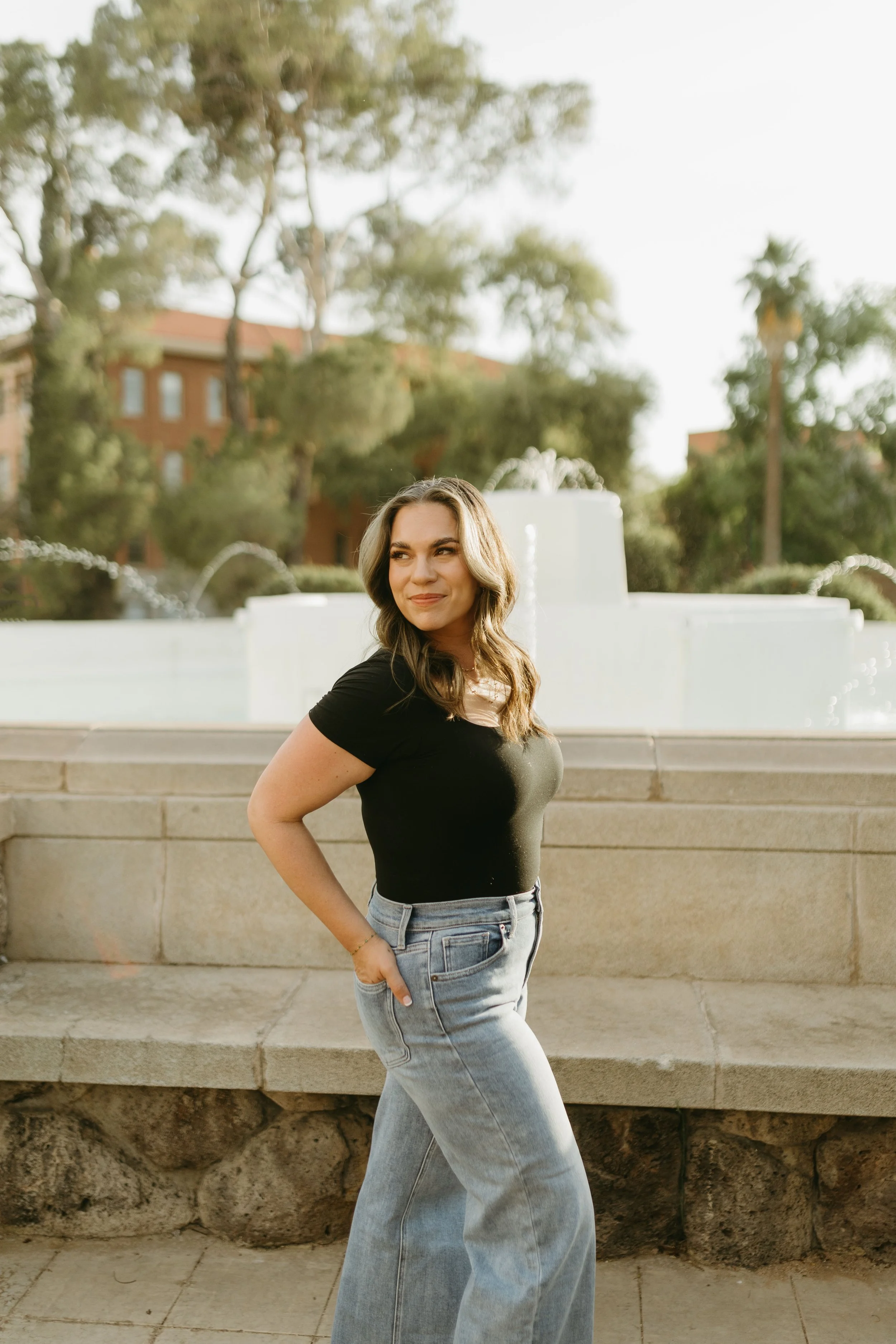 female therapist in front of fountain