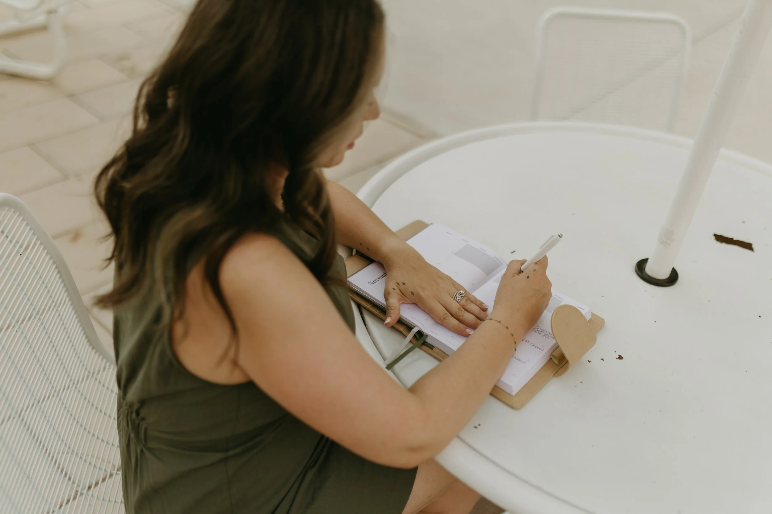 female therapist taking notes