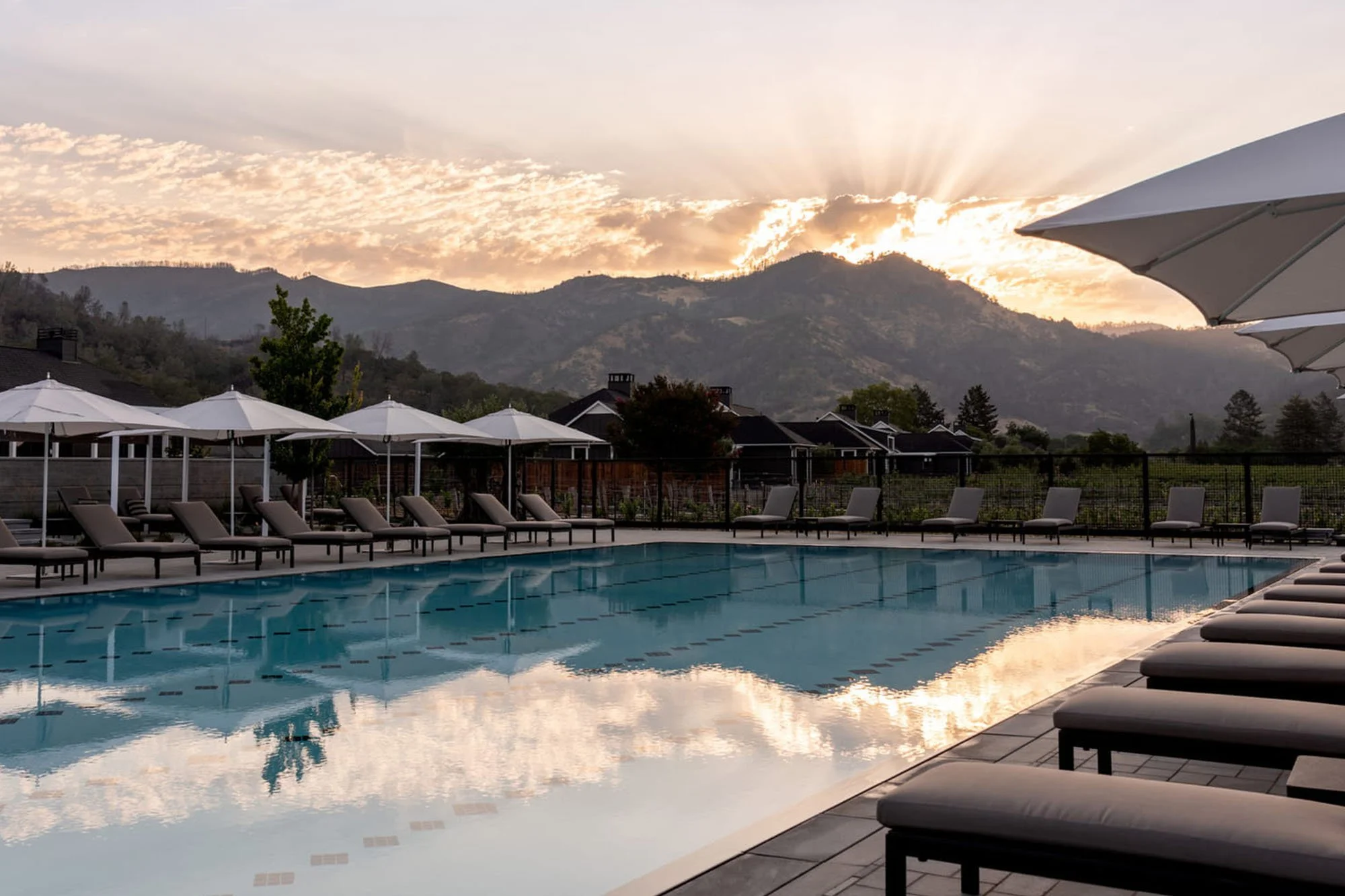 Outdoor pool area at Four Seasons Napa Valley designed to connect with surrounding vineyard environment
