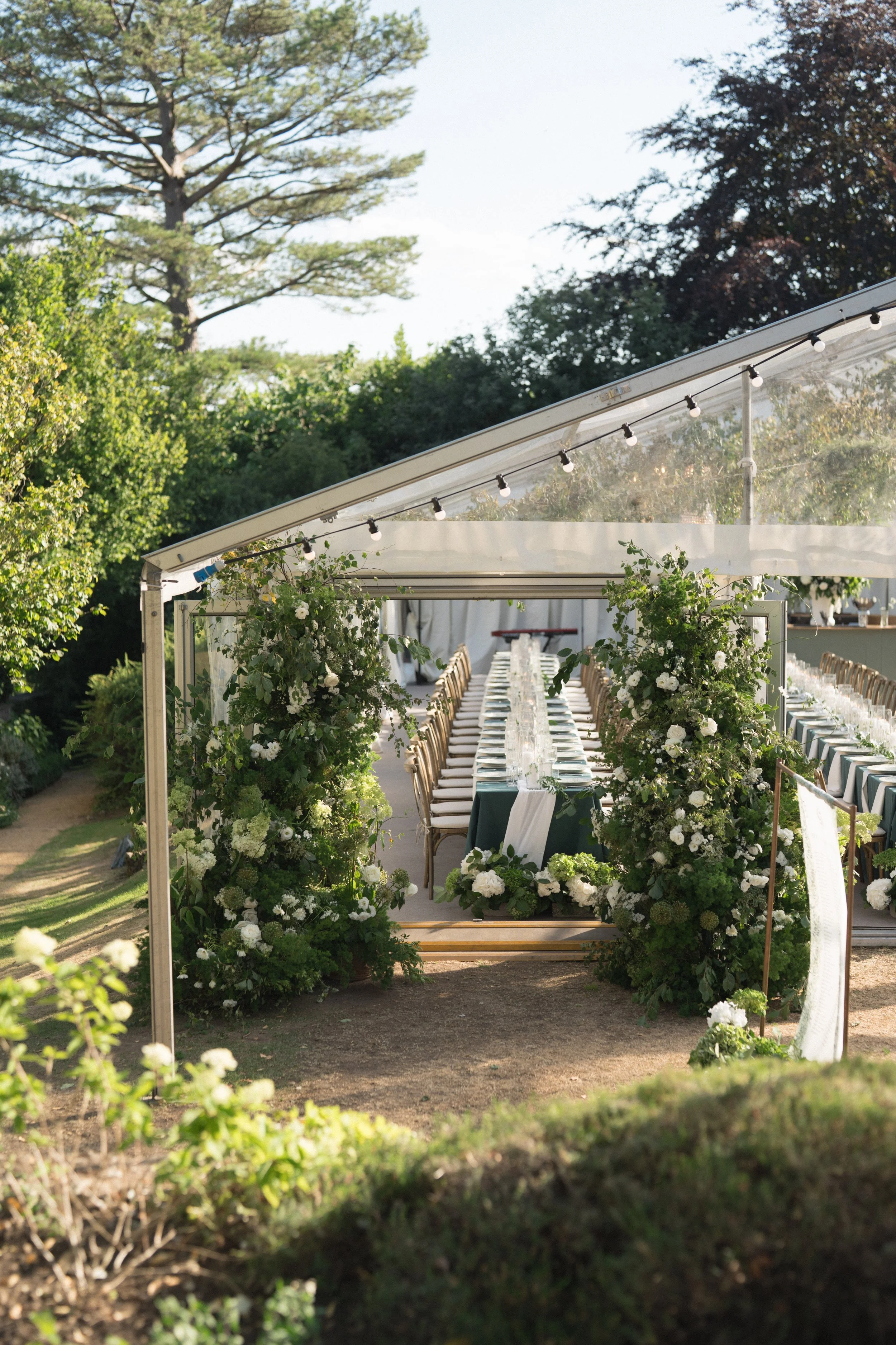 marquee-wedding-reception-greenery-ceiling-installation.jpg