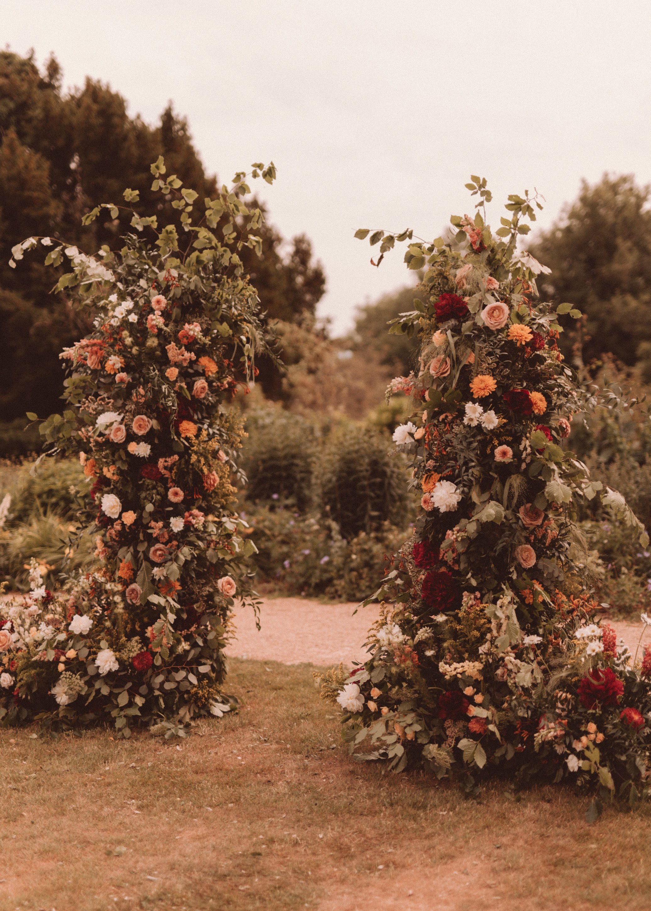 broken-floral-arch-wedding-ceremomy-english-garden-wedding.jpg