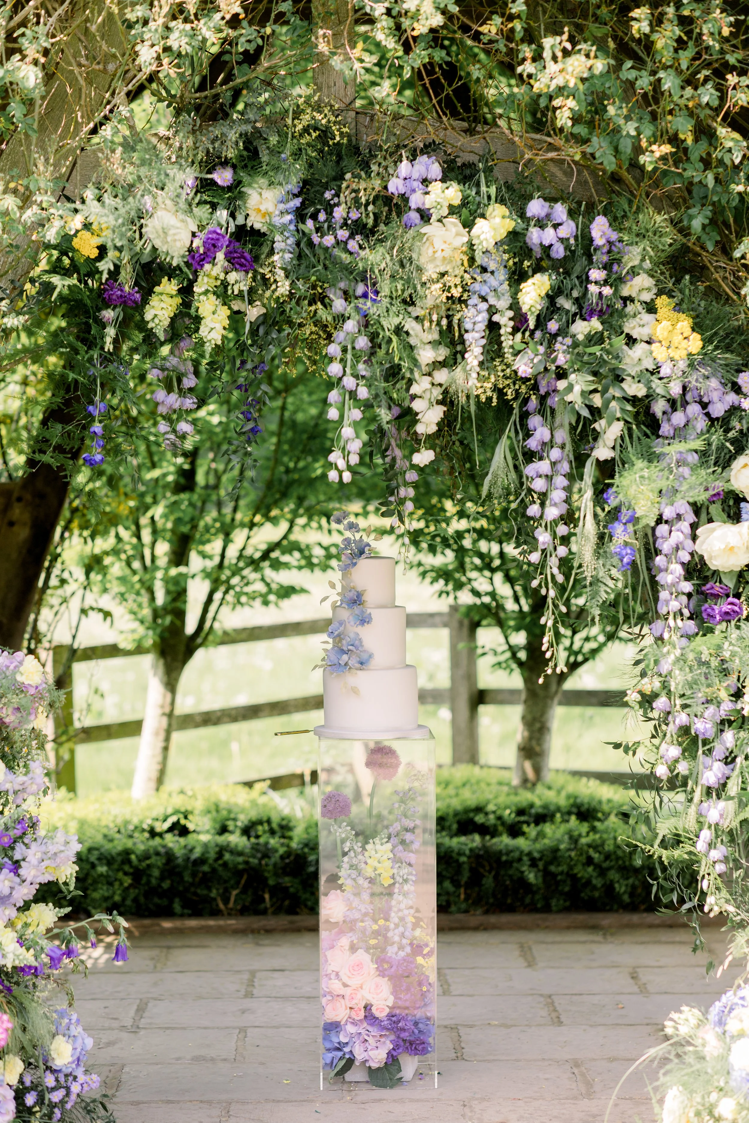 colourful-wedding-ceremony-flowers-hyde-house-cotswolds.jpg