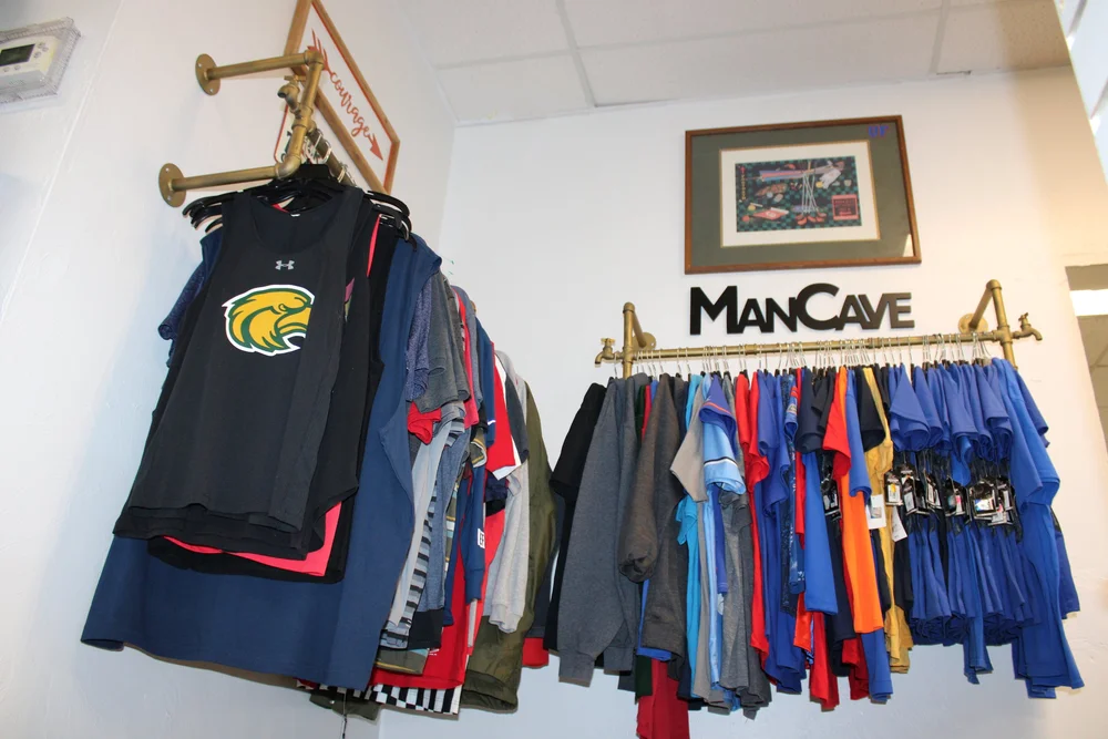 Belfair Market clothing racks with assorted apparel