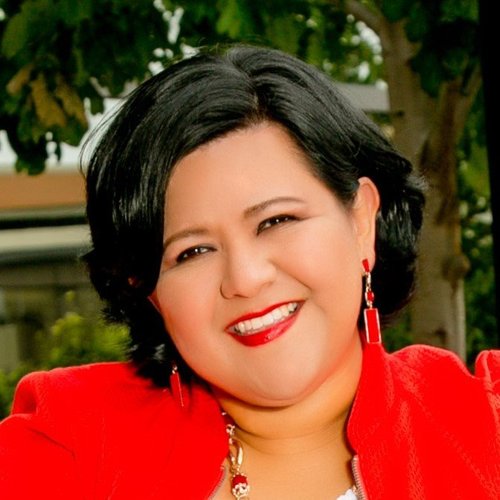 Perla J. Alarc&oacute;n-Flory, Class A Certified Spanish Court Interpreter and partnered interpreter for immigration psychological evaluations.
