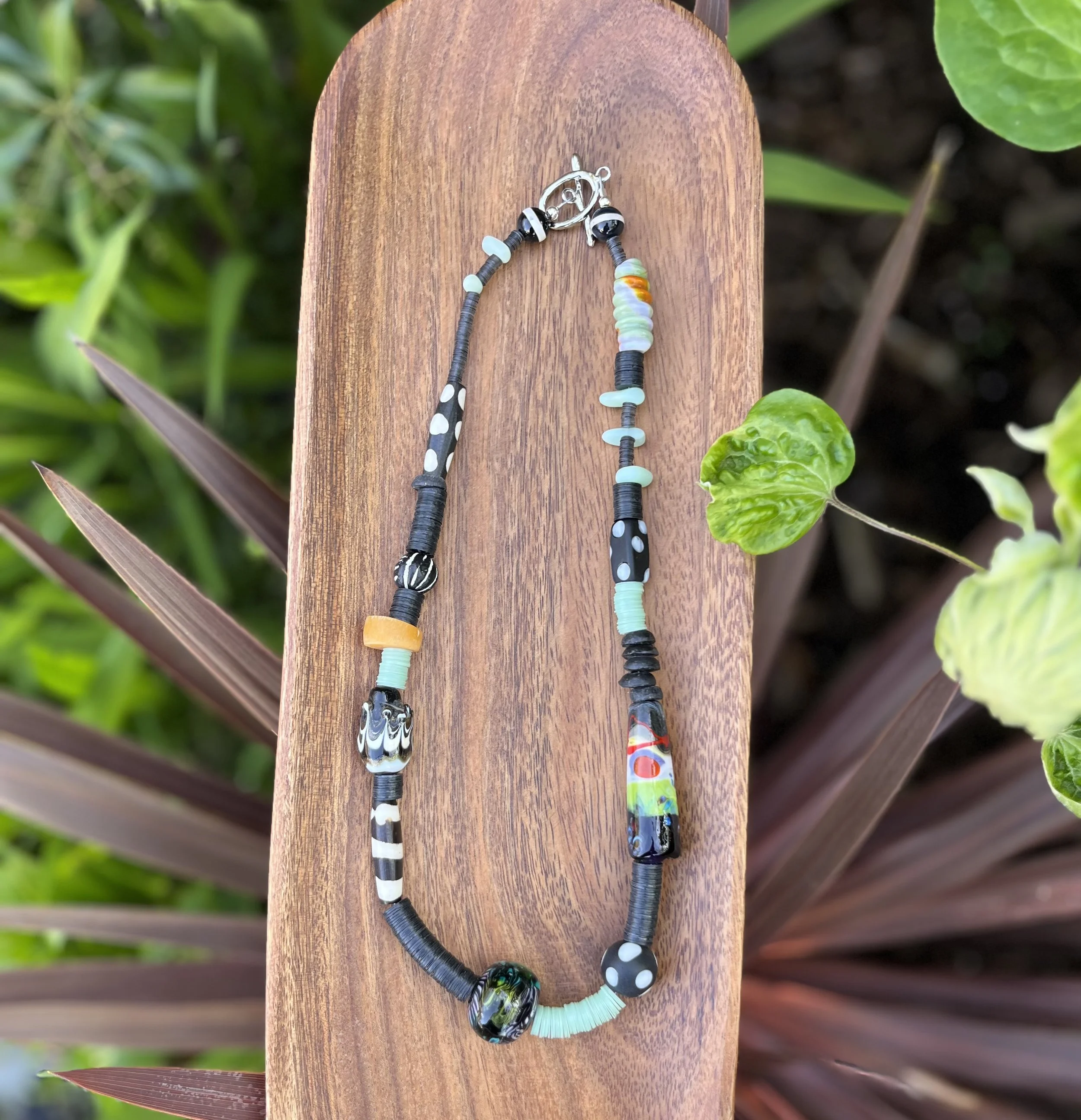 Statement Necklace with Green Glass, Vinyl Discs & Polka Dot Accents